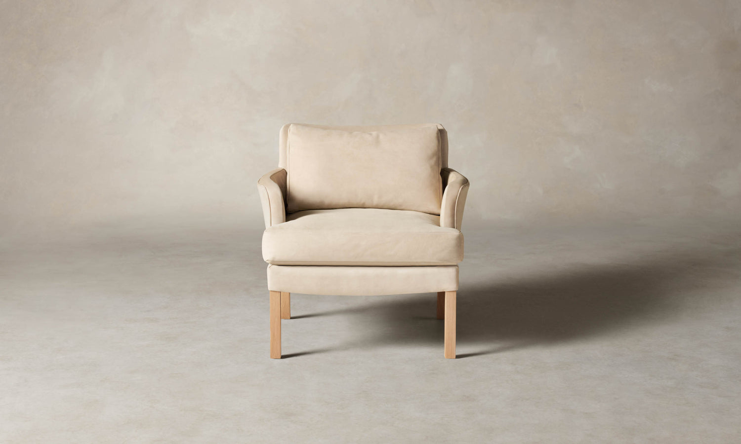 kaye leather accent chair in grey nubuck leather with wooden legs, front view