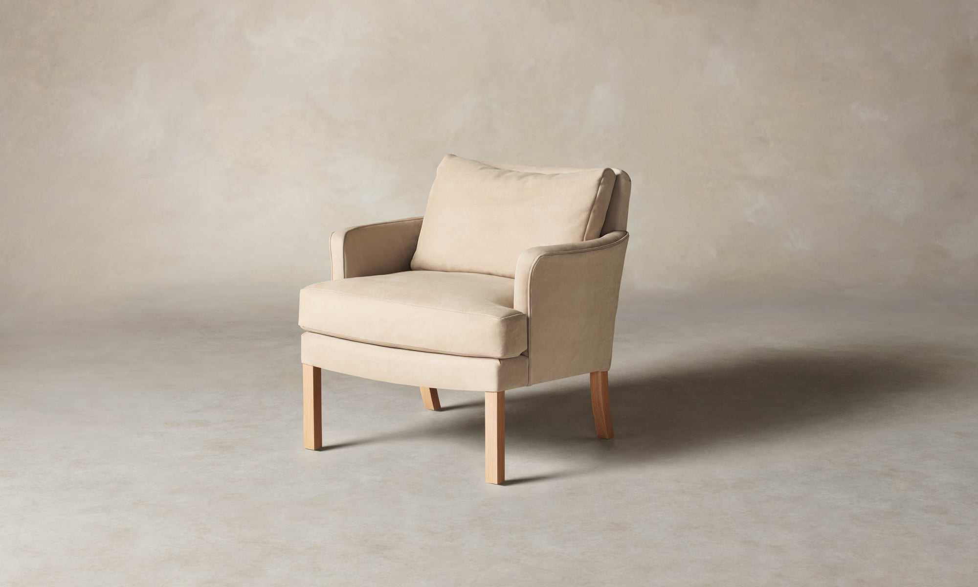 kaye leather accent chair in grey nubuck leather with wooden legs