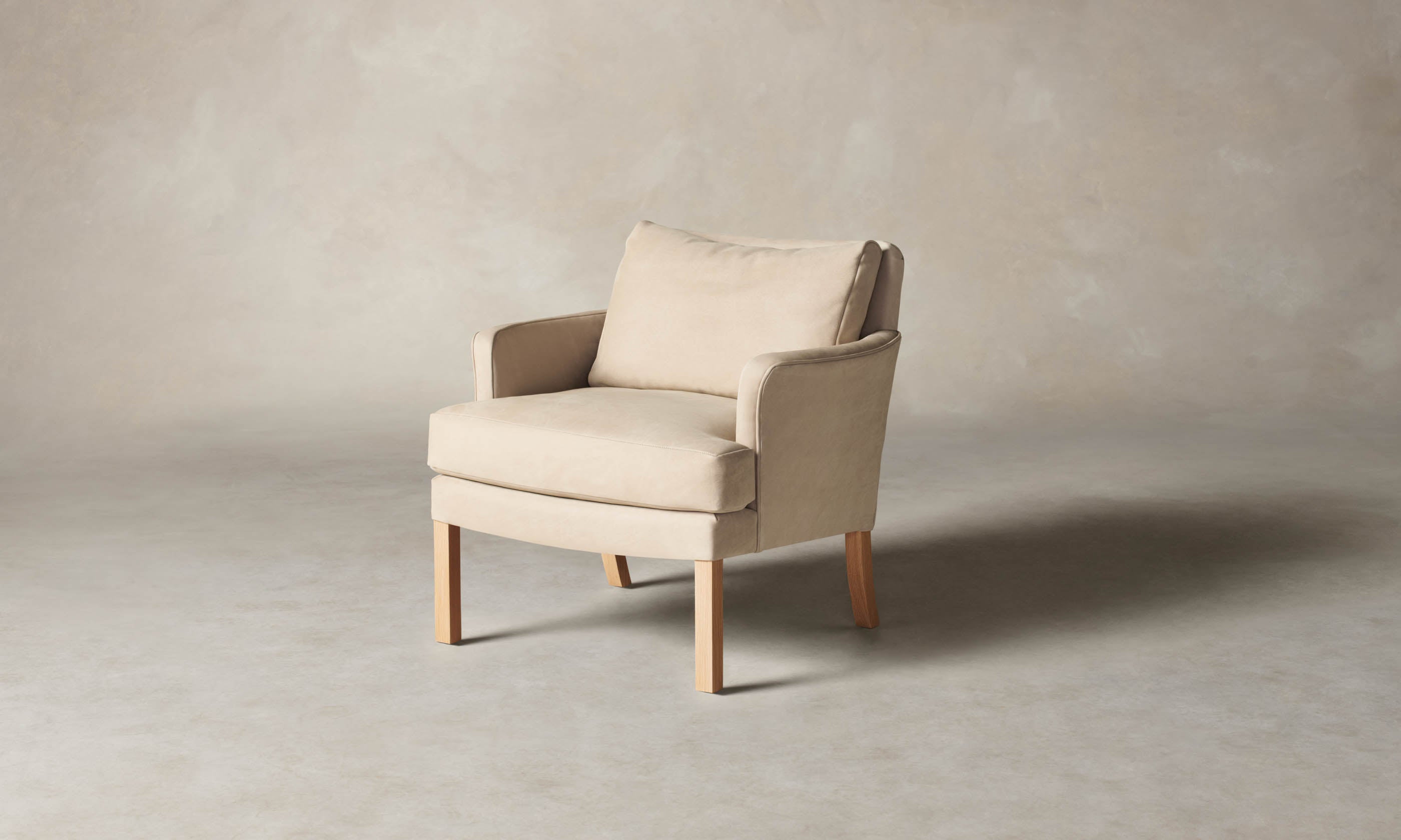 kaye leather accent chair in grey nubuck leather with wooden legs