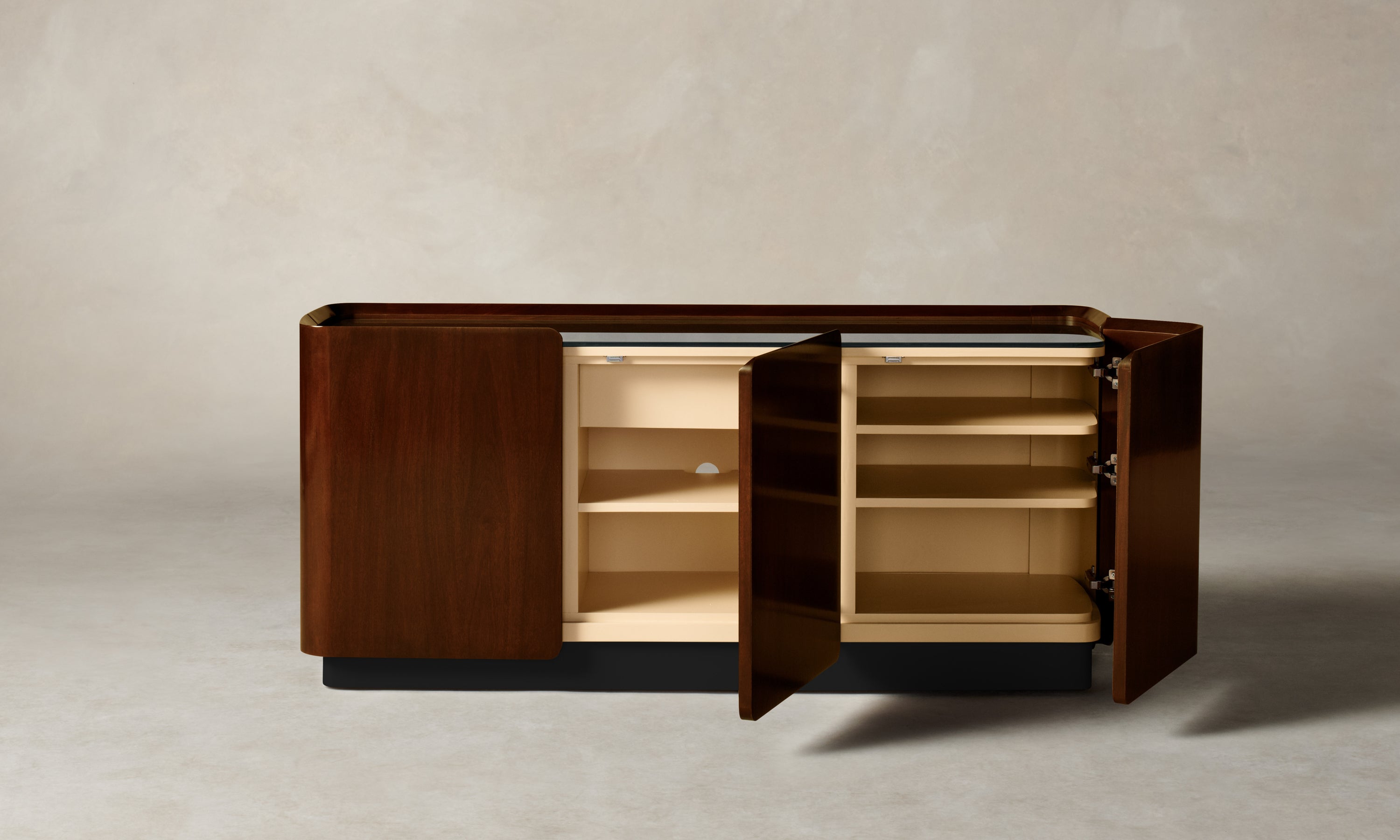 sabine dark oak wood sideboard with three doors and a glass top, lacquered inside