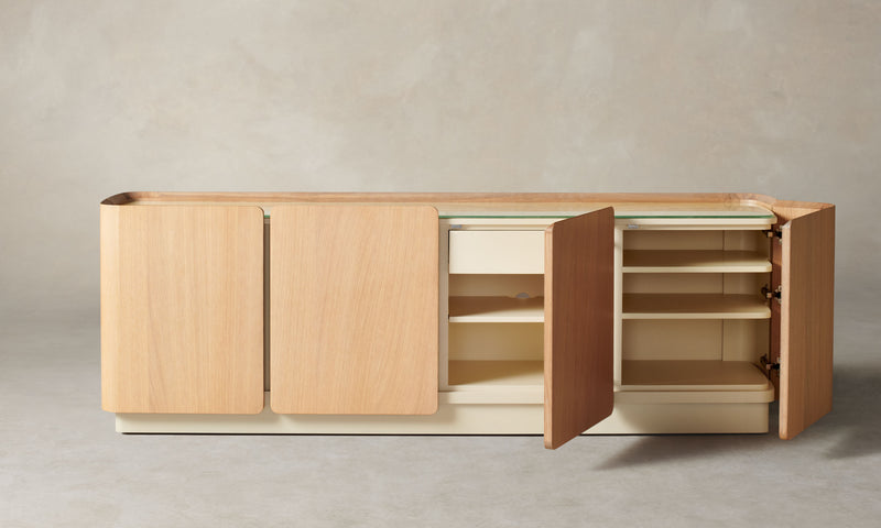 sabine oak wood sideboard with 4 doors and a glass top with lacquered inside