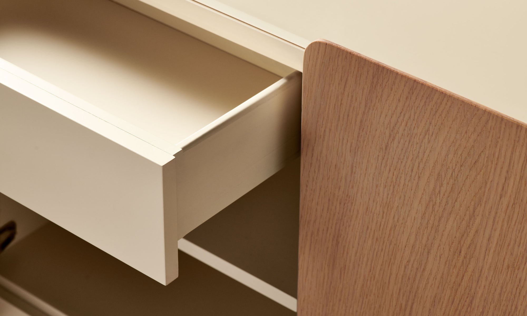 sabine oak wood sideboard with 4 doors and a glass top, drawer close up