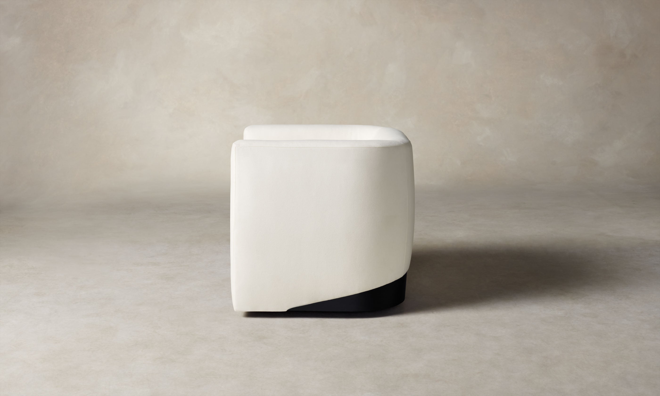 henri white wool swivel chair with wood accent, side view