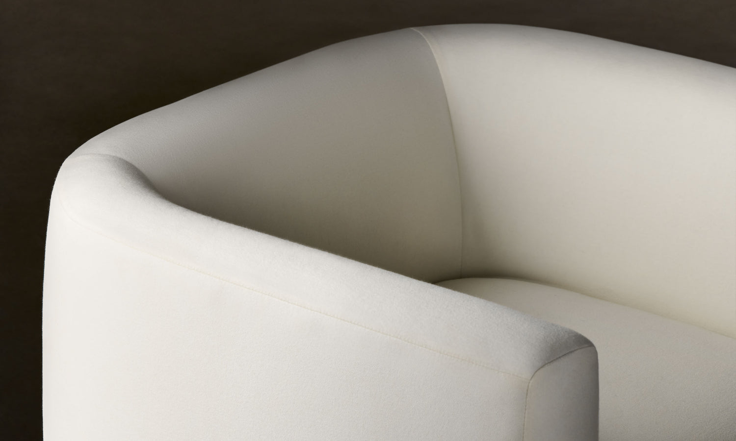 henri white wool swivel chair with wood accent, close up view