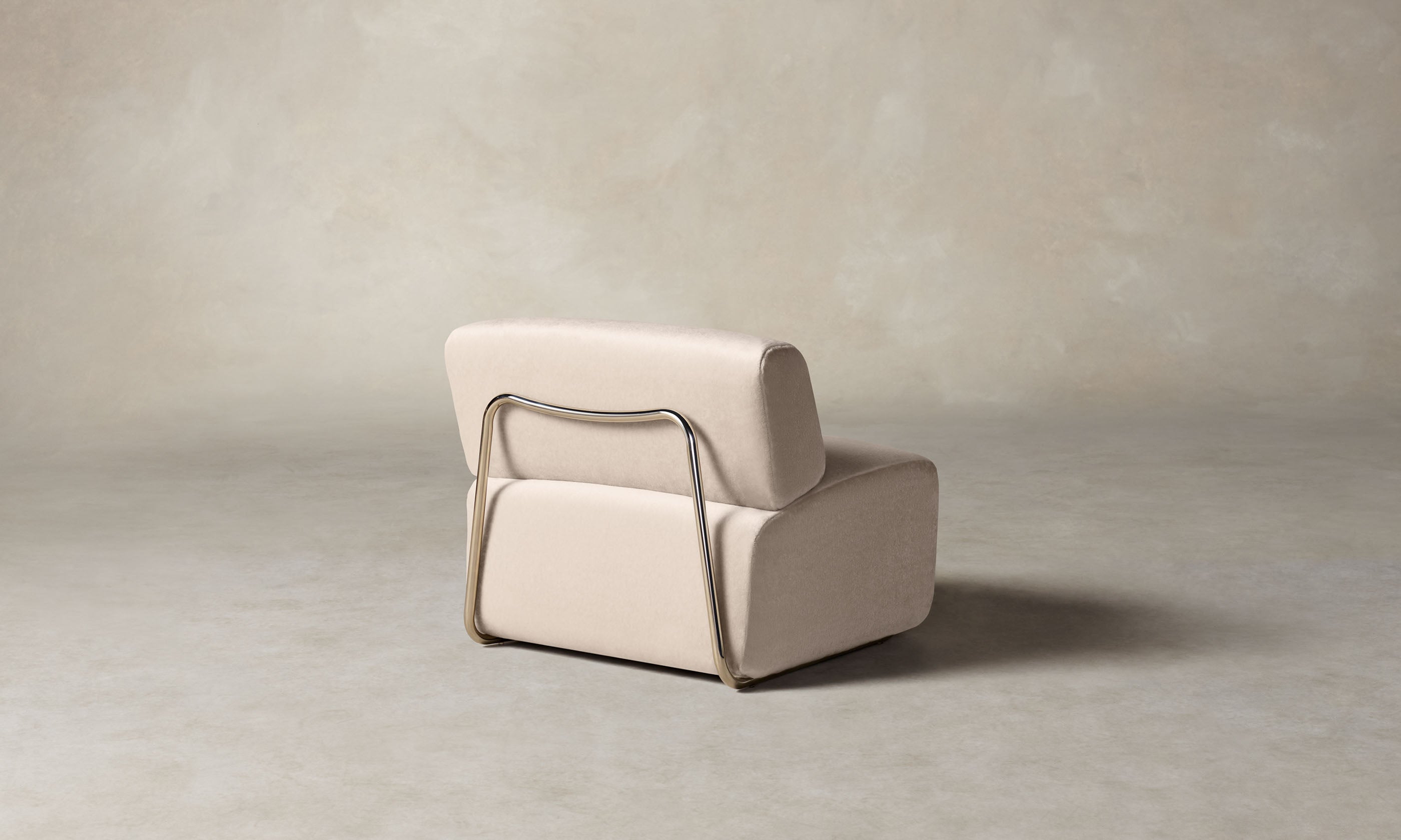 miles armless modular accent chair in beige limestone, back angle view