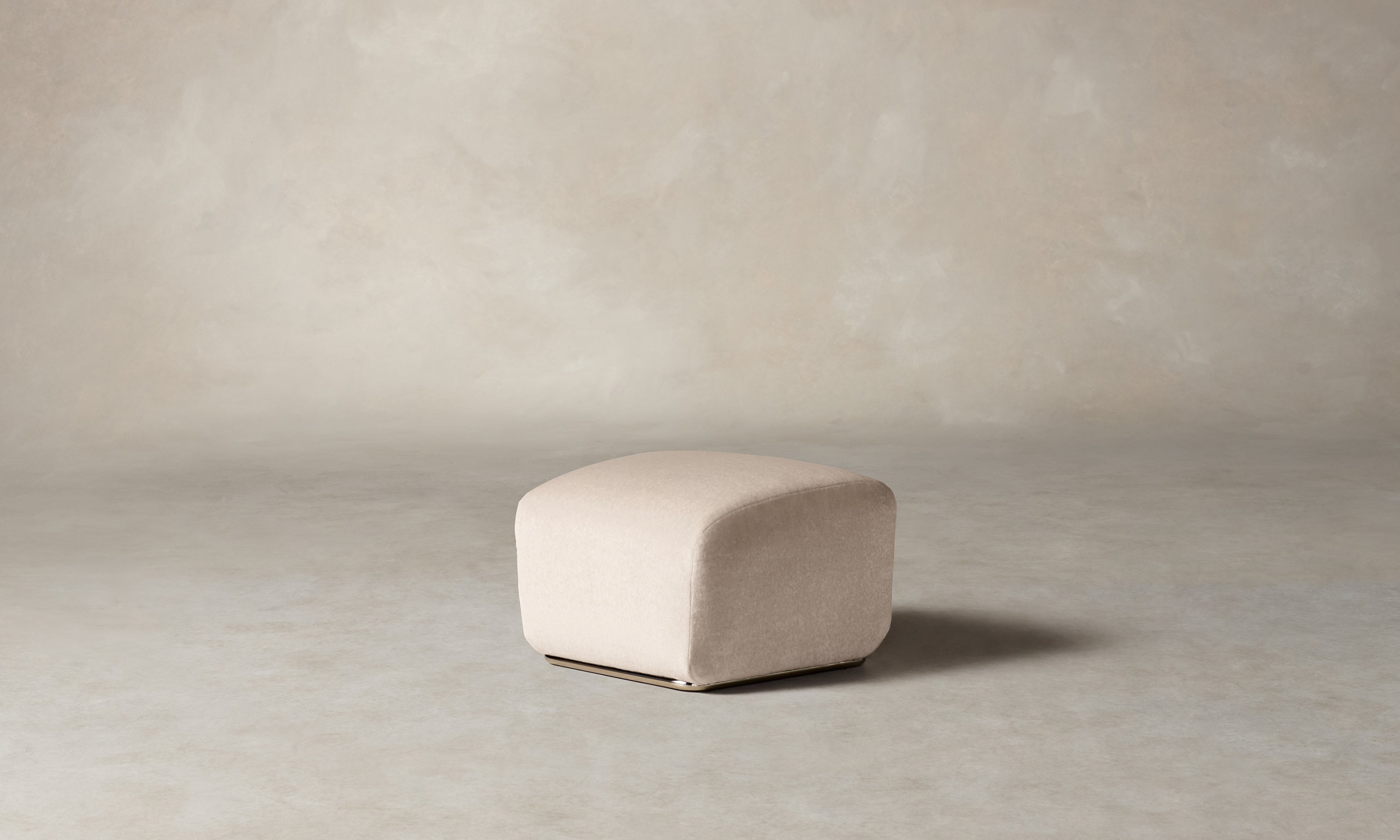 miles modular sectional ottoman in dusty pink mohair with curved shape