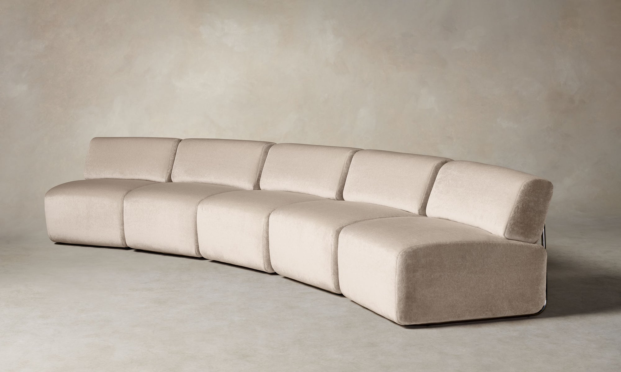 miles modular sectional in beige mohair with curved shape