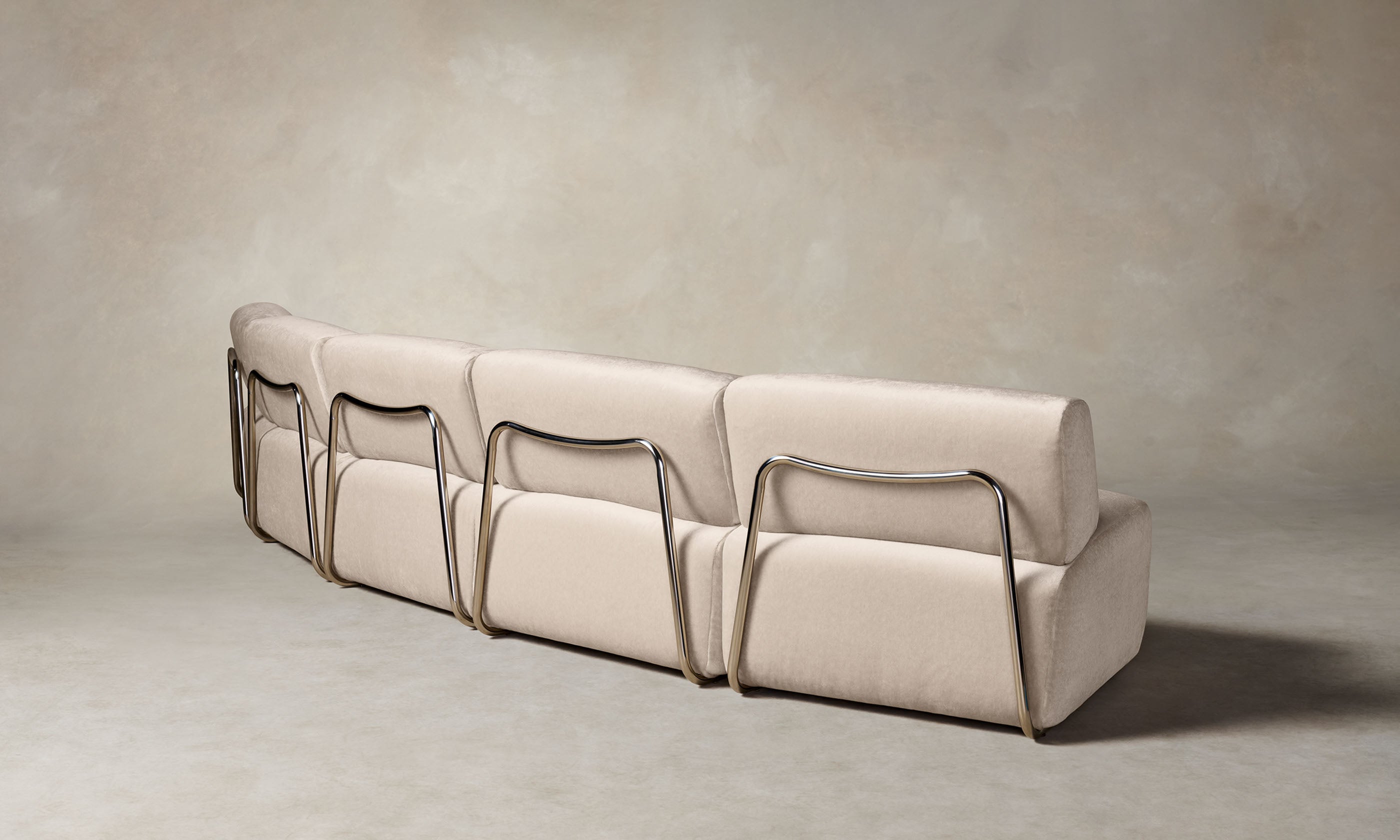 miles modular sectional in off-white mohair with curved shape, back view