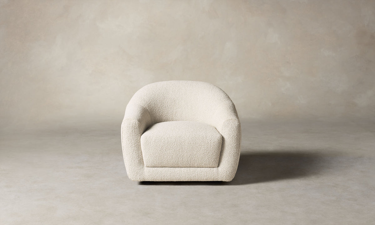 oliver accent chair in white boucle with curved back