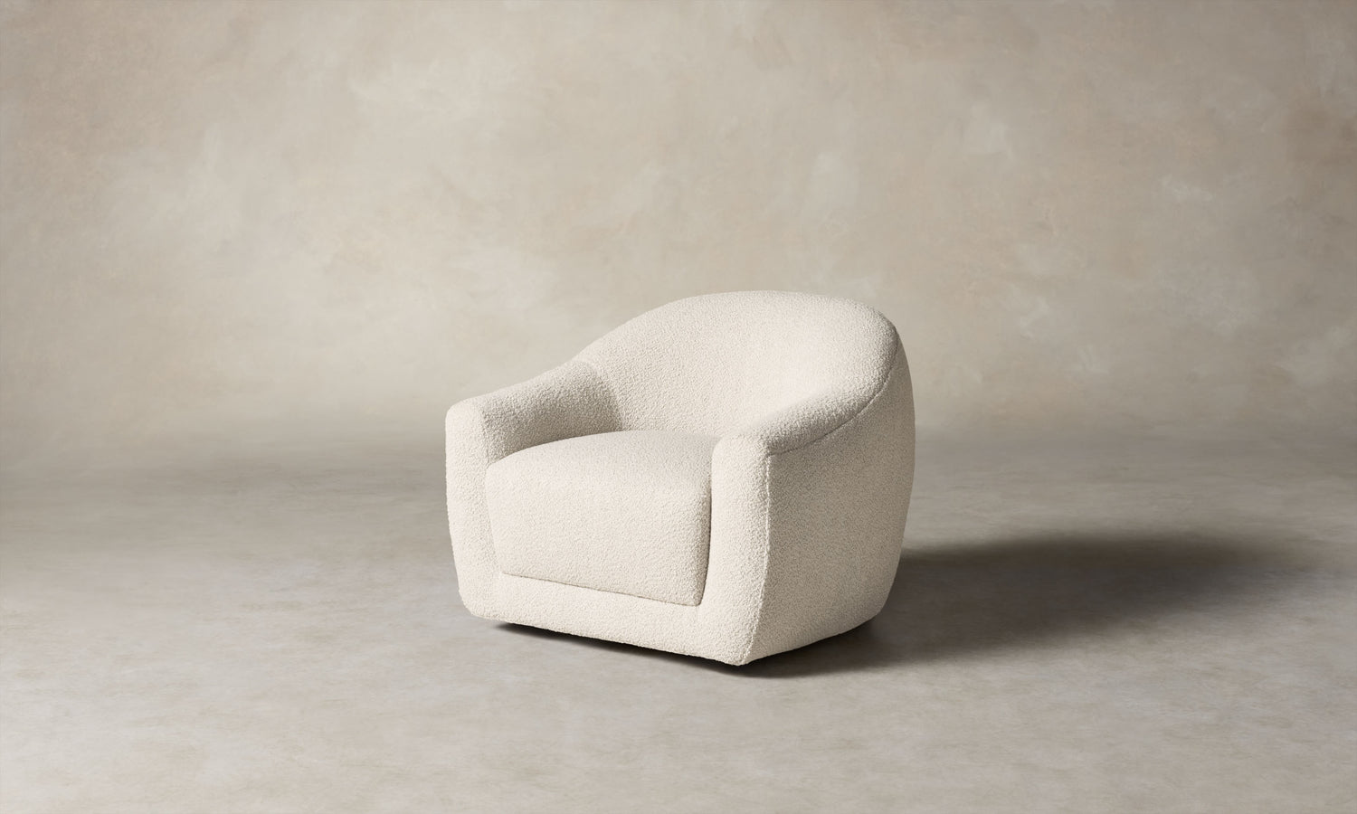oliver accent chair in white boucle with curved back, angle view