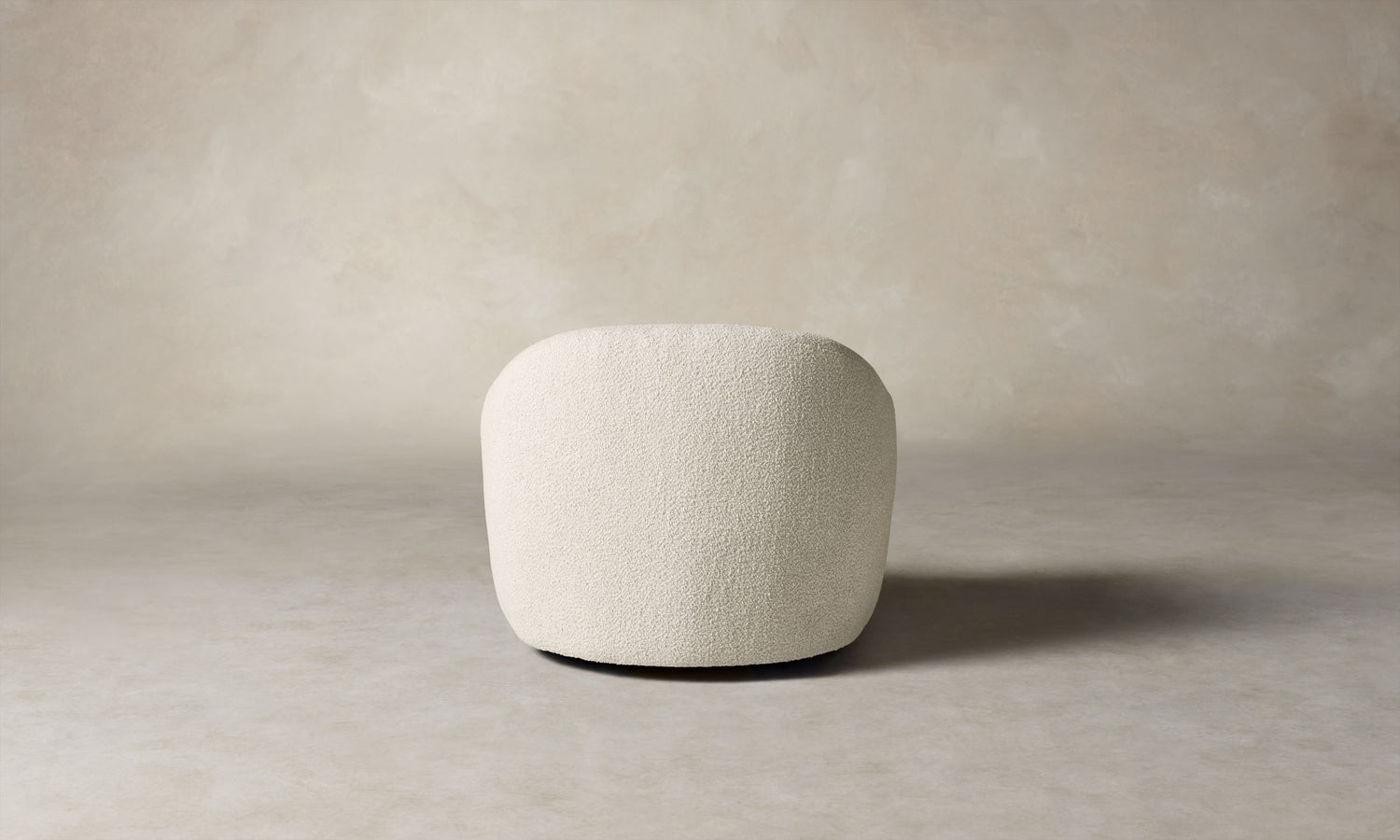 oliver accent chair in white boucle with curved back, back view