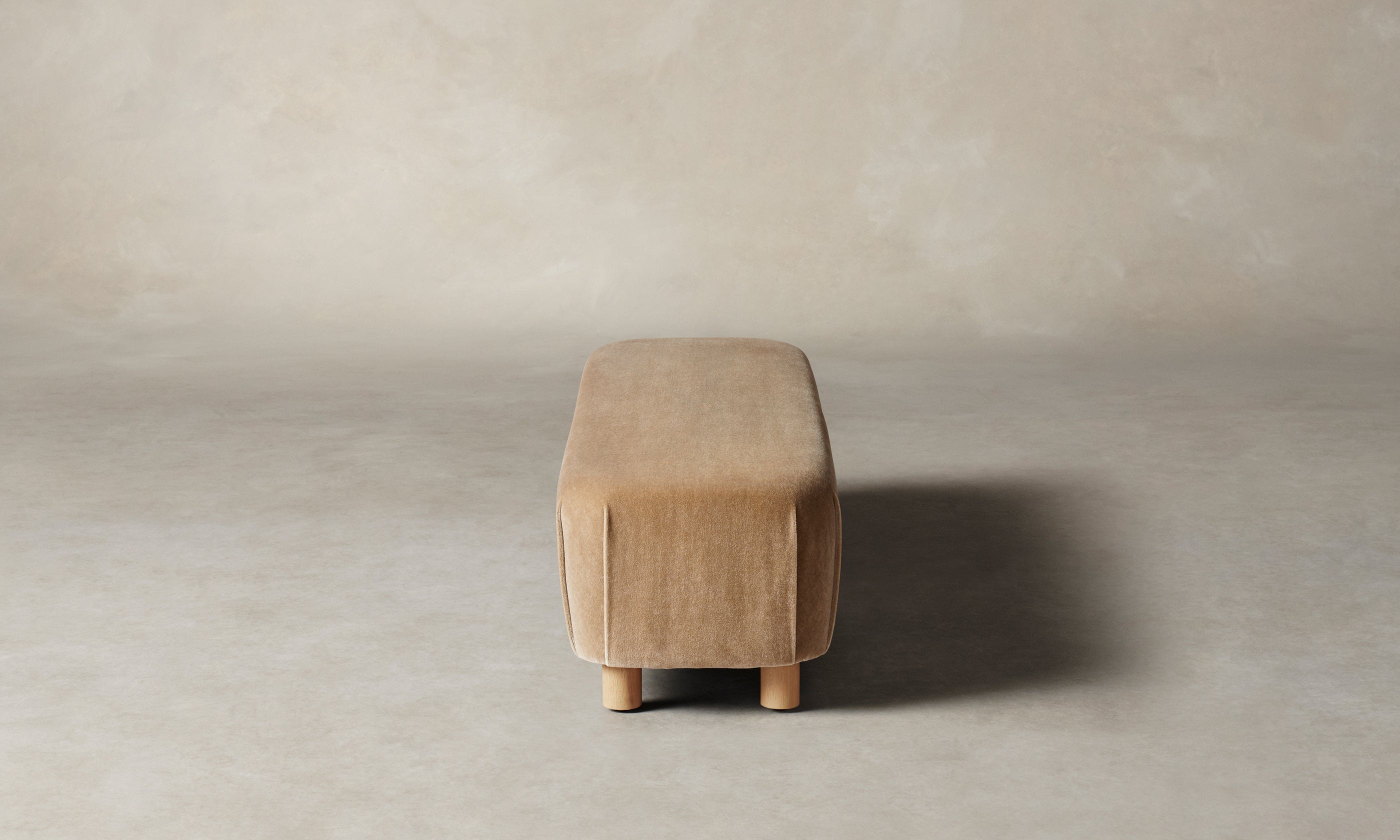 perry bench in beige mohair with wooden legs, side view
