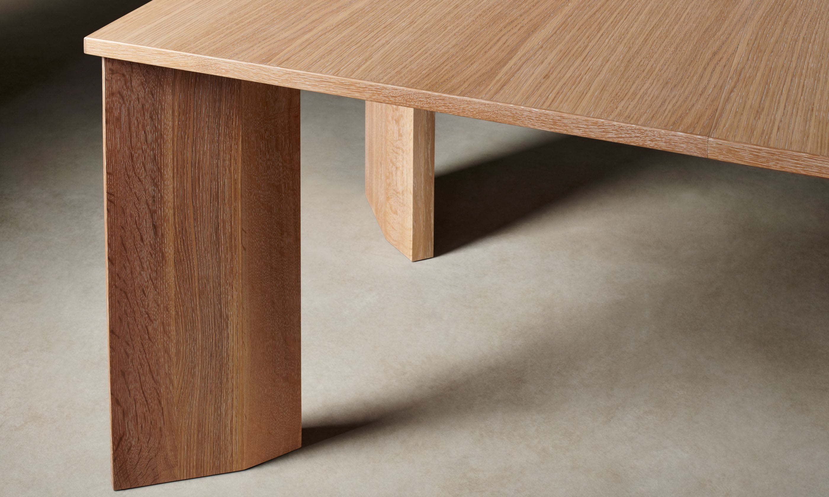 york solid white oak wood extendable dining table, leg close up