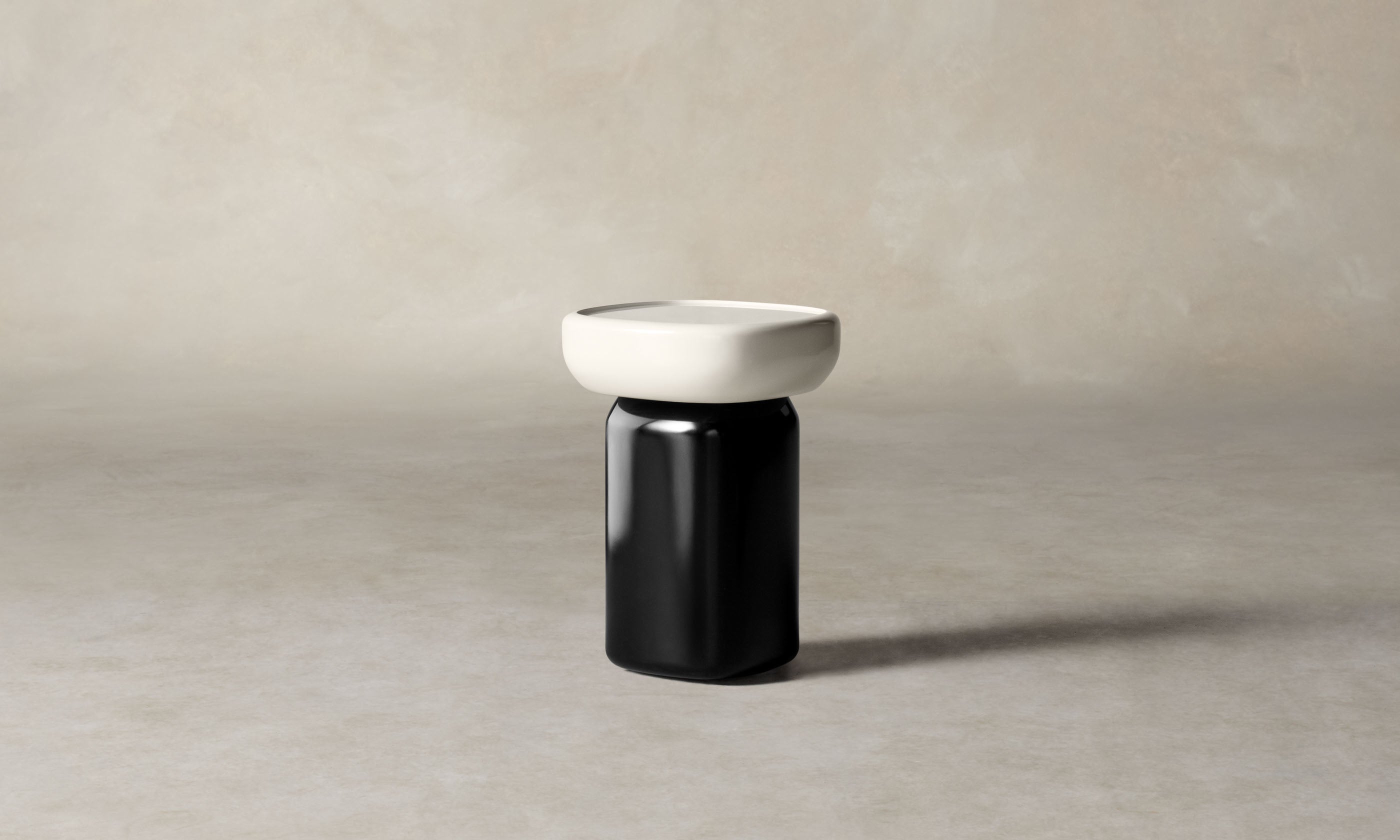 emile glass coffee table with lacquered black base and white opaque glass top in art deco style, side view