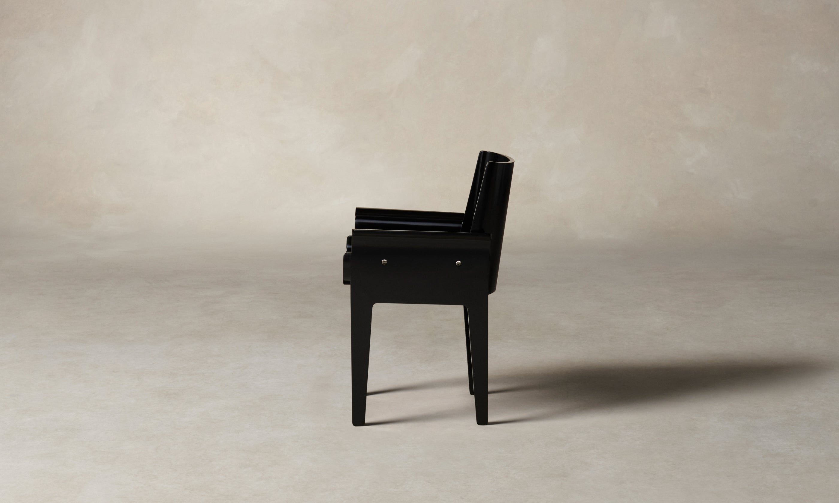 leon black lacquered dining armchair, side view