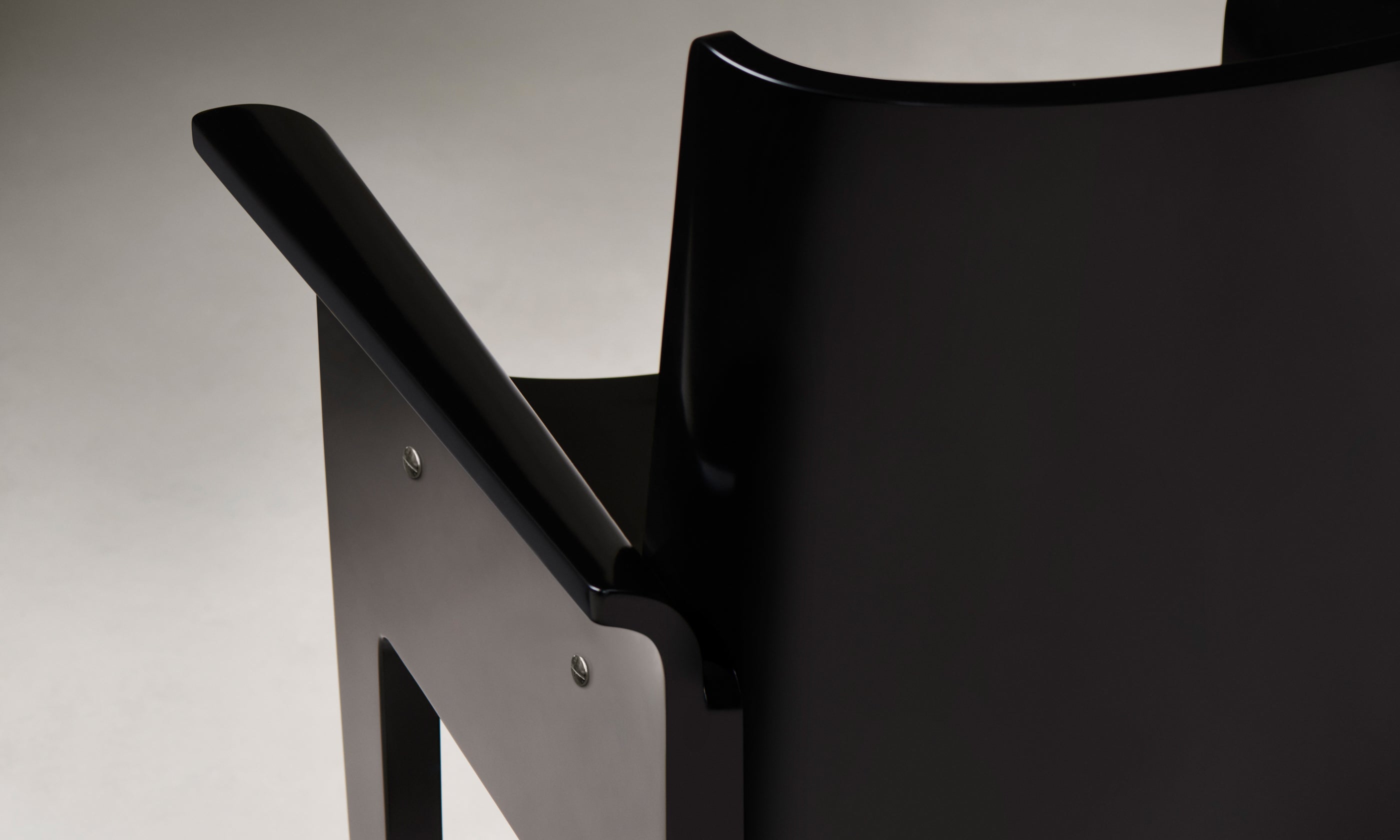 leon black lacquered dining armchair, close up back view