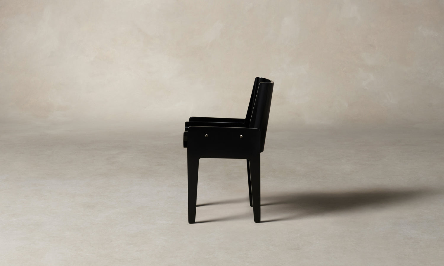leon black lacquered wood dining chair, side view