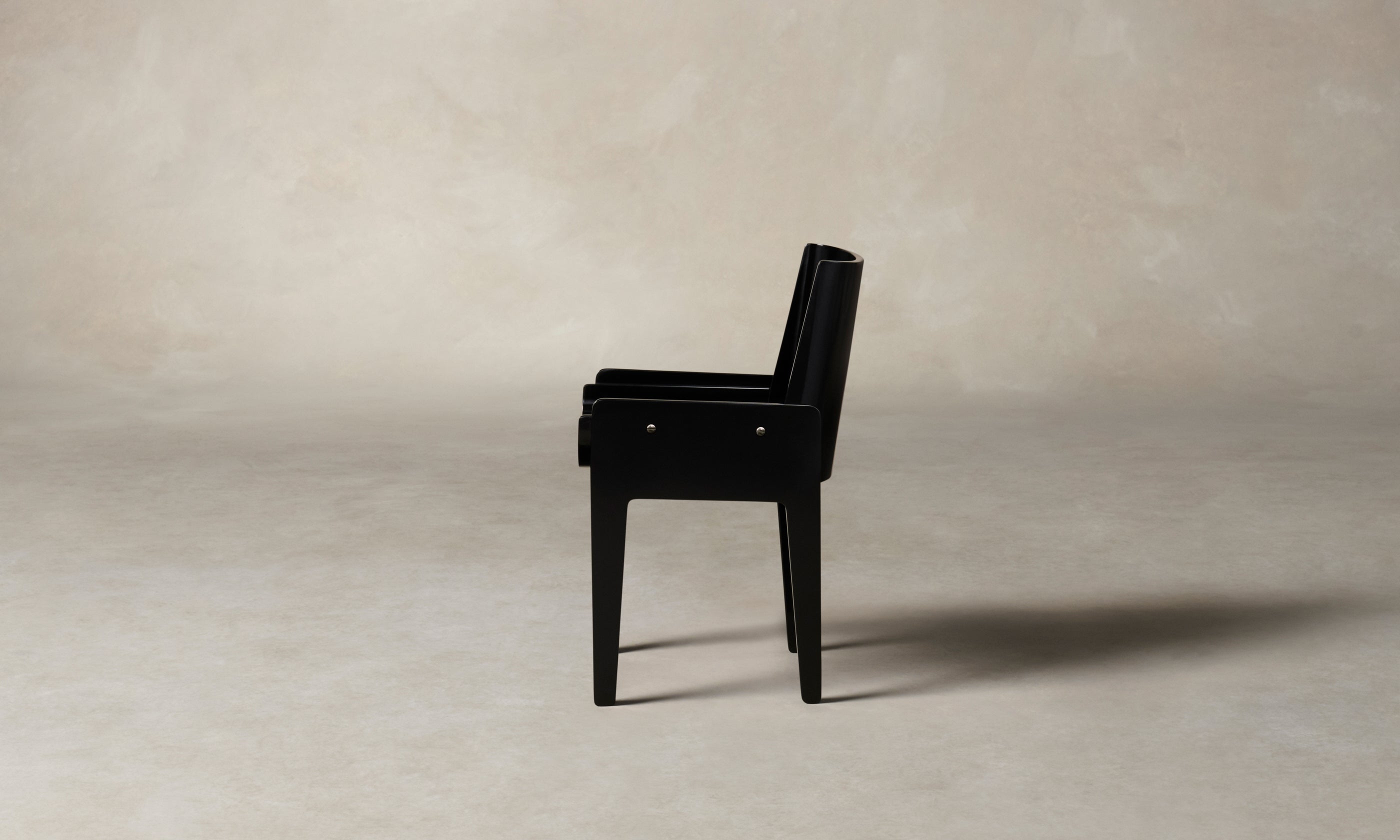 leon black lacquered wood dining chair, side view
