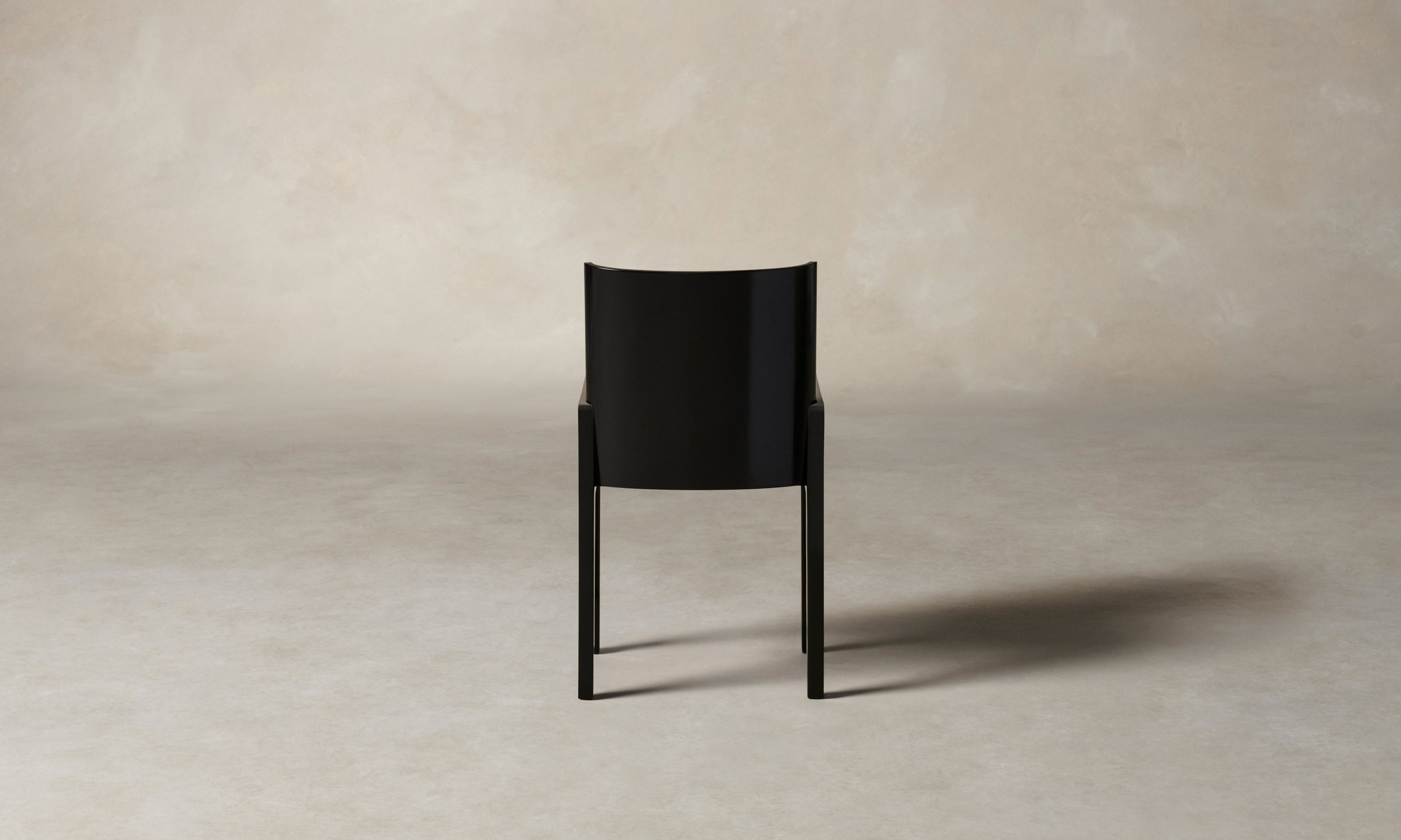 leon black lacquered wood dining chair, back view