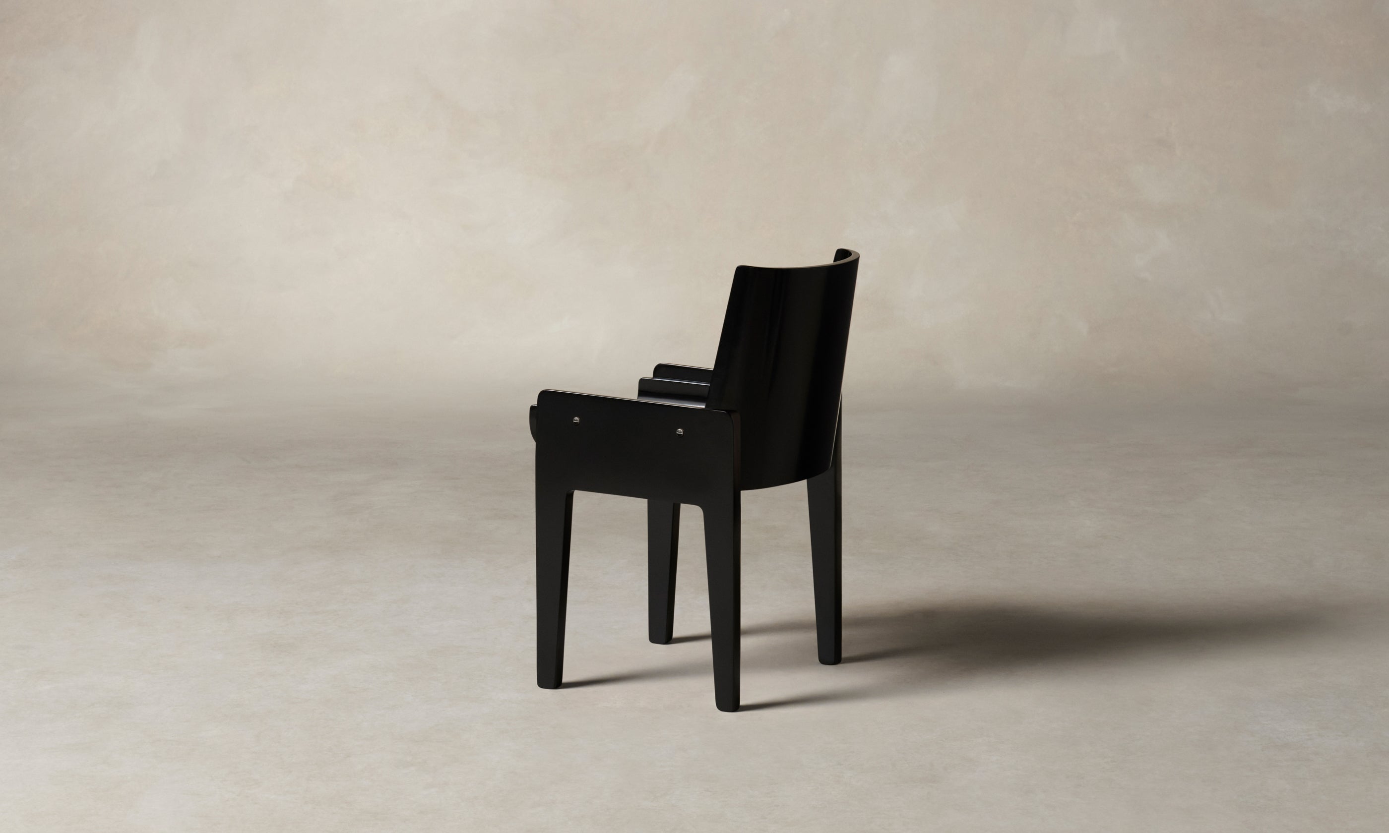leon black lacquered wood dining chair, angle view