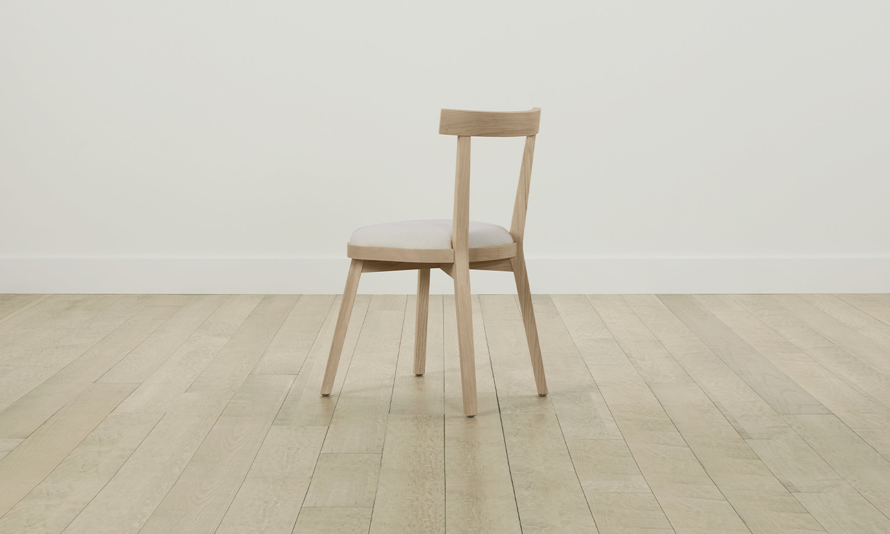 allen dining chair in white ash wood and white linen seat, back view