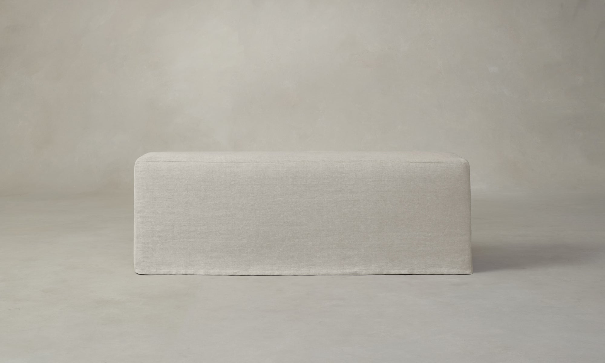 beacon slipcovered dining bench in off-white inen