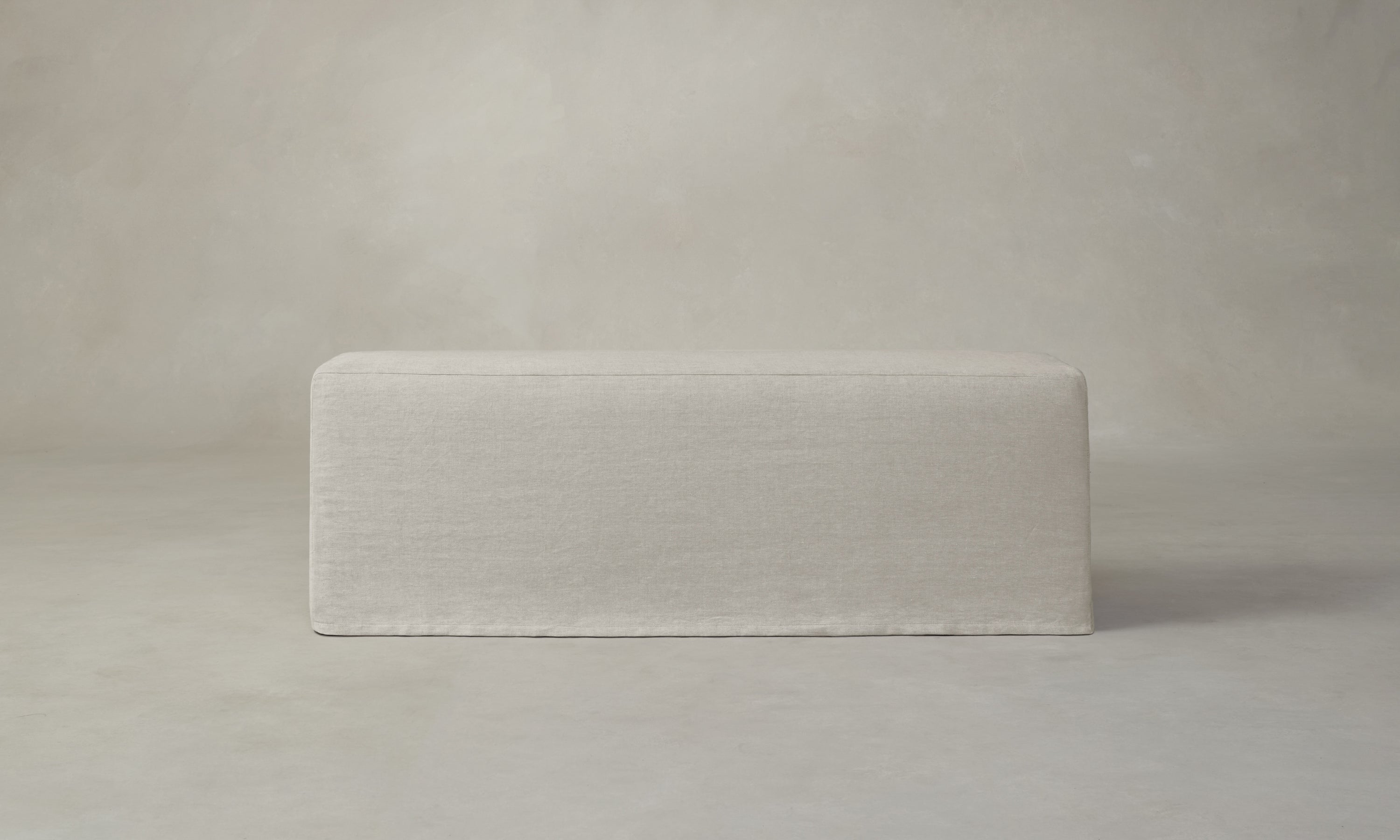 beacon slipcovered dining bench in off-white inen