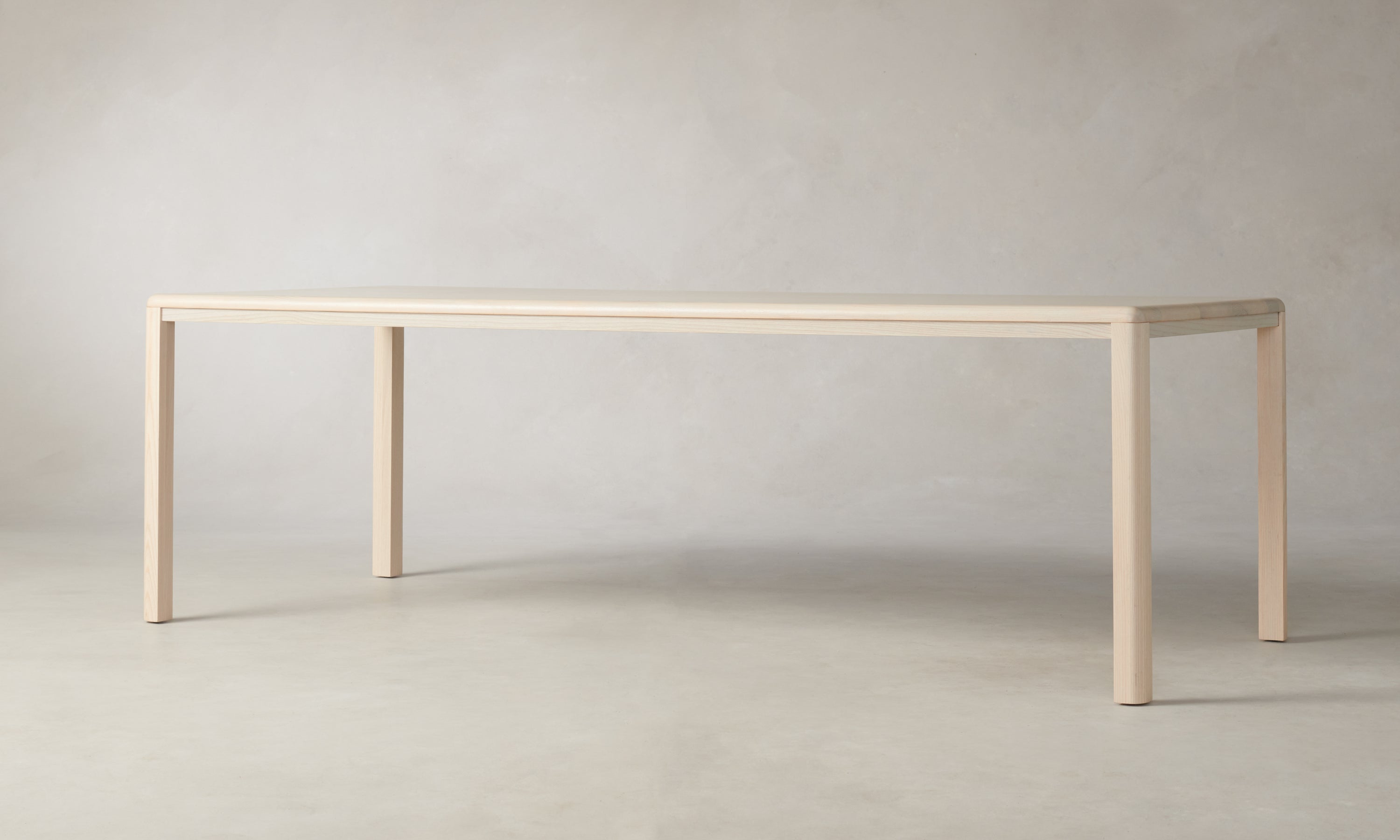 bedford rectangular wood dining table in white ash wood, angle view