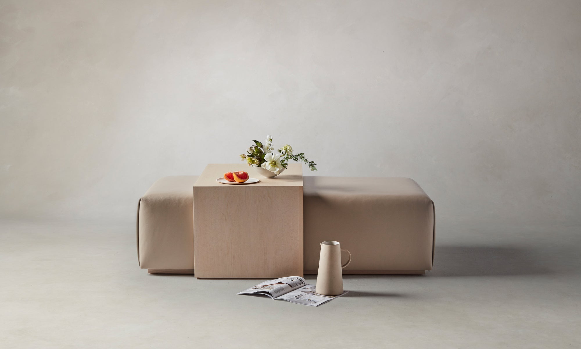 bowery ottoman with wood tray in beige stone leather and ash wood