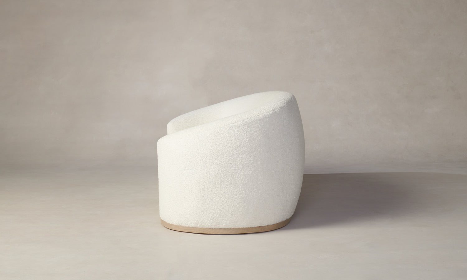 chelsea curved sofa in white boucle - side view