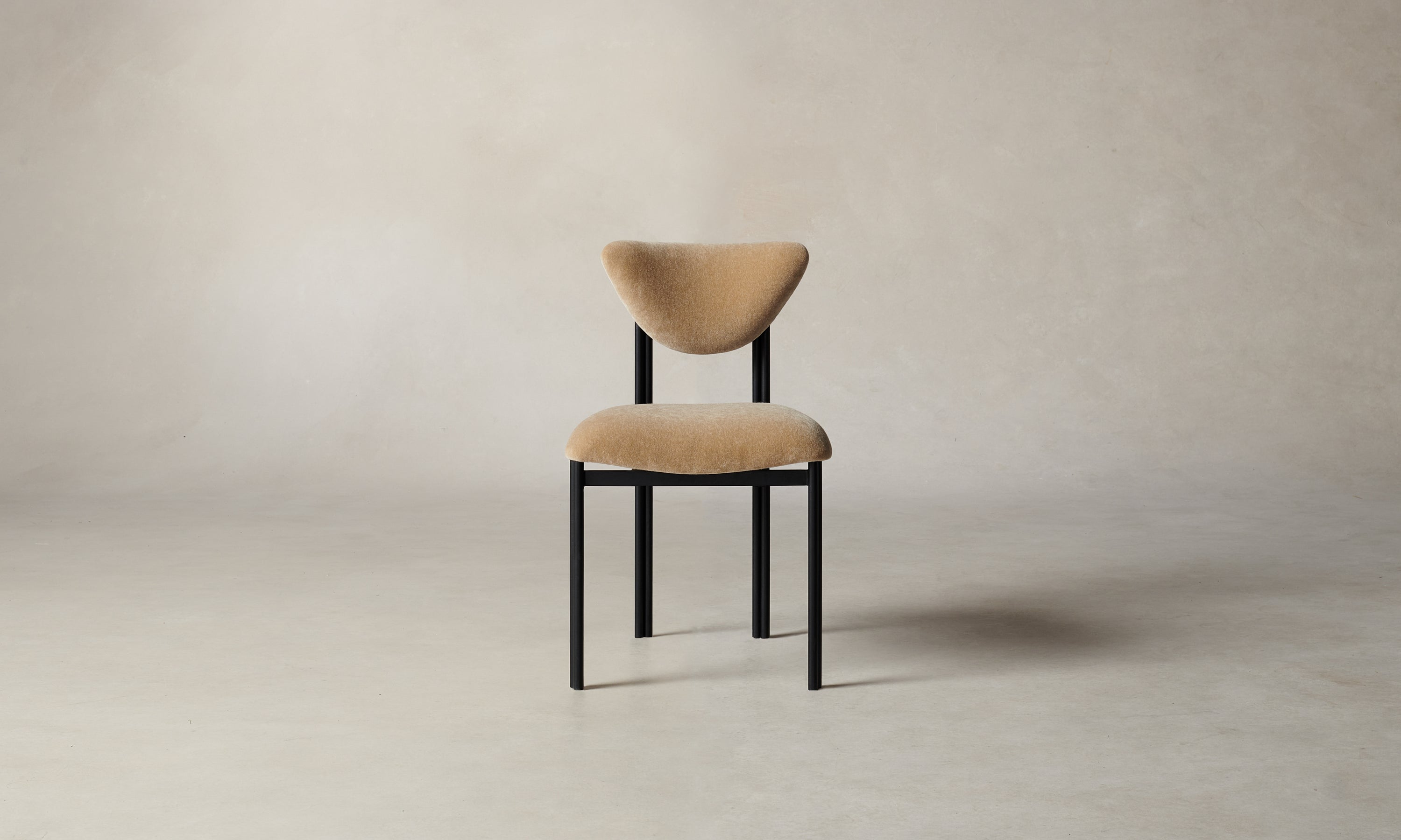 cooper dining chair with steel frame and brown mohair fabric