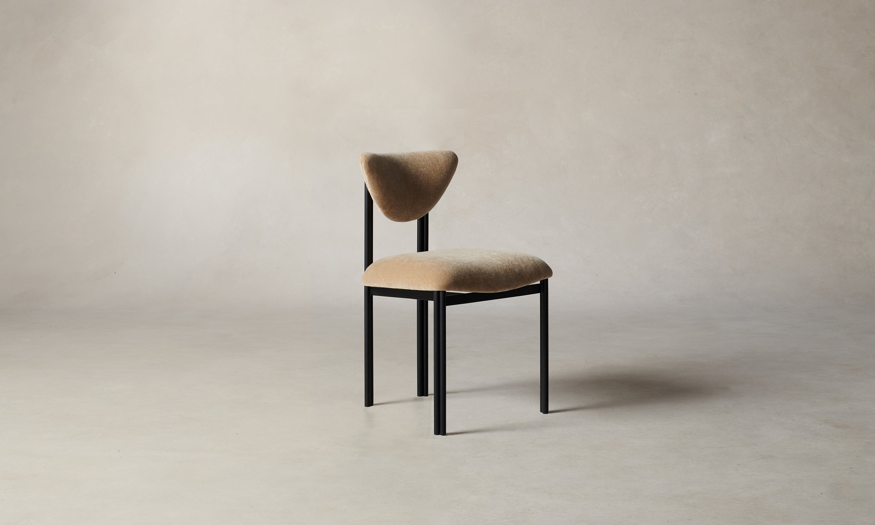 cooper dining chair with steel frame and brown mohair fabric - angle view