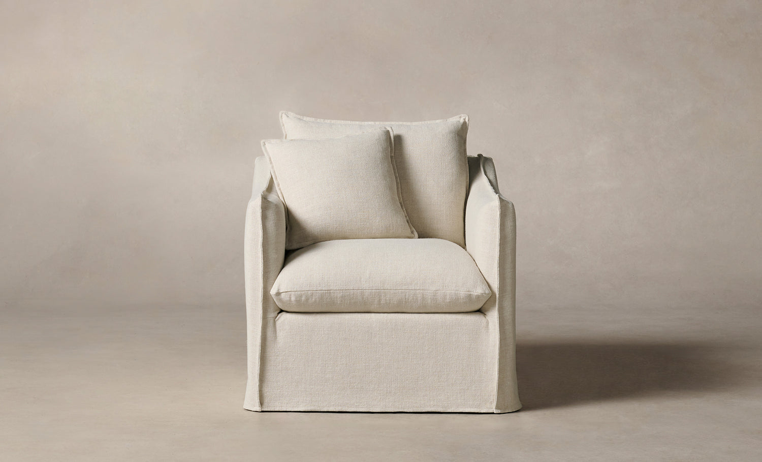 dune white linen upholstered accent chair with cushions