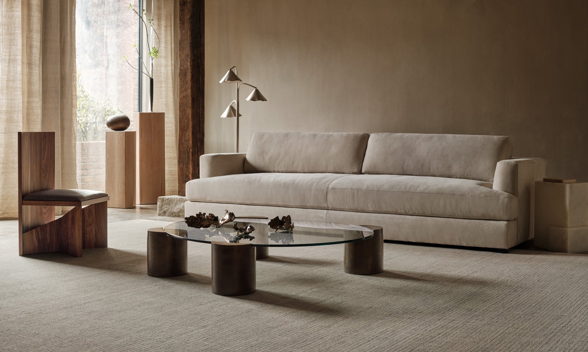 galerie wood pedestals in white oak in a modern living room