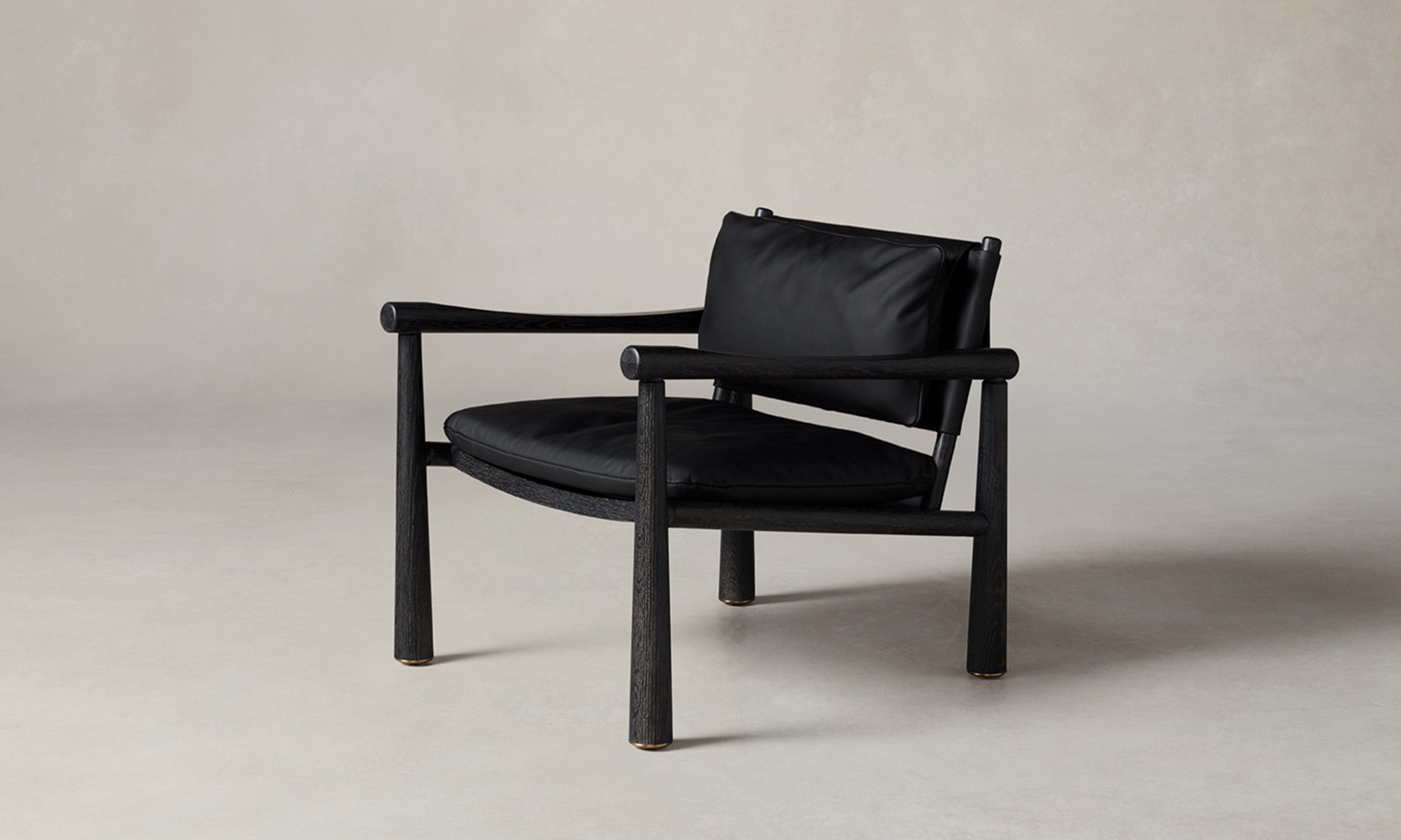 hyde oak chair with arms and black leather seat and back