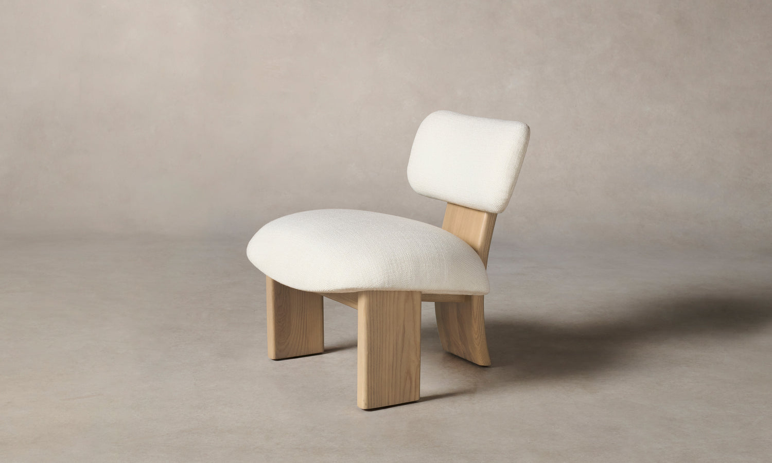 kenmare accent chair in white linen with ash wood frame and three legs