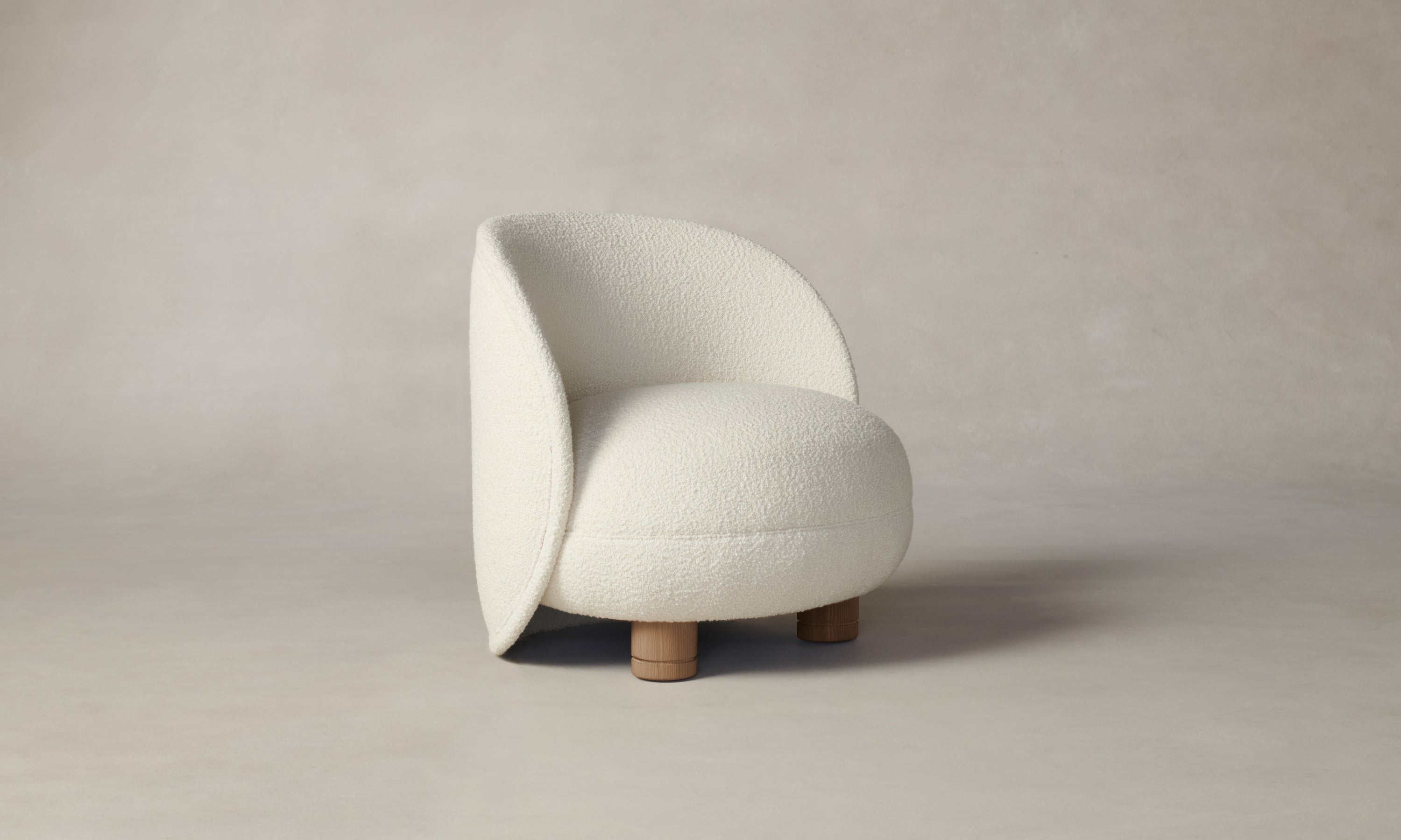 laight round white boucle accent chair with wooden legs
