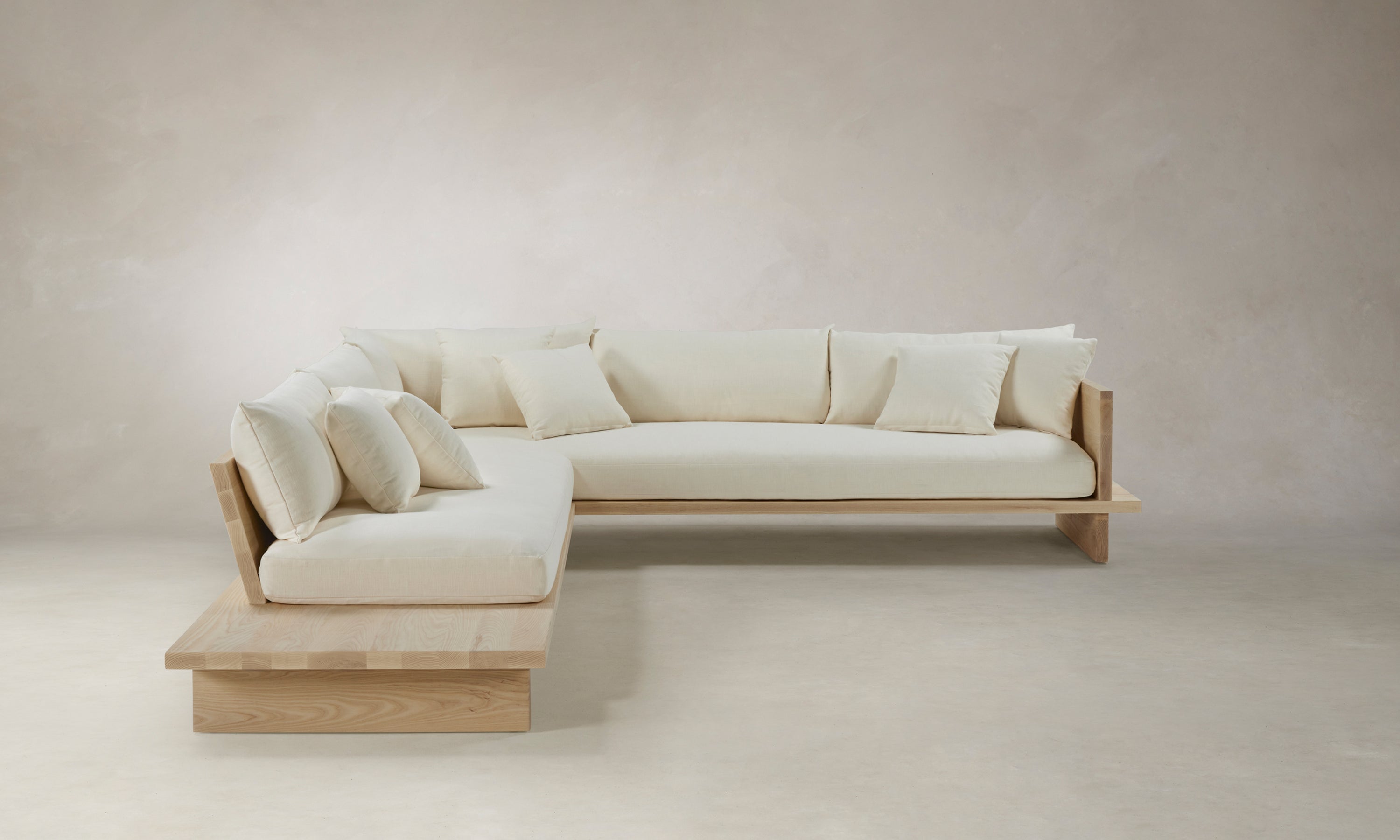 muir white linen l-shaped sectional sofa with built-in shelf - side view