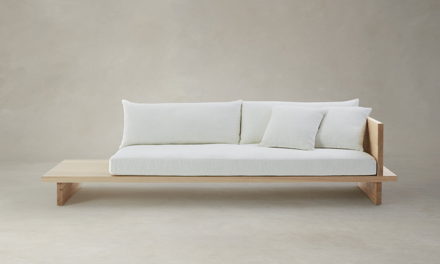 muir sofa with built in table in white chenille fabric and wooden trim