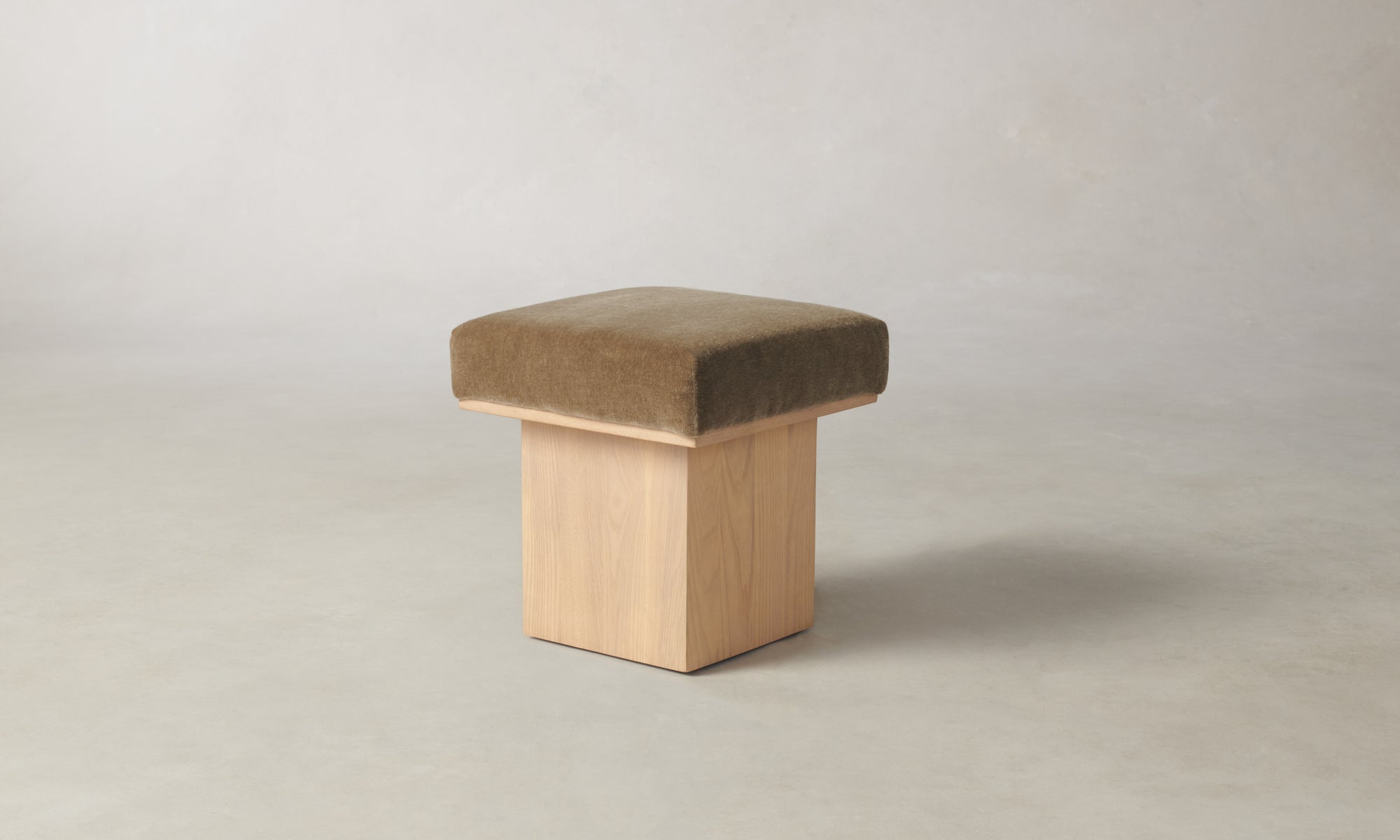 mulberry ottoman with wood base in mink mohair fabric