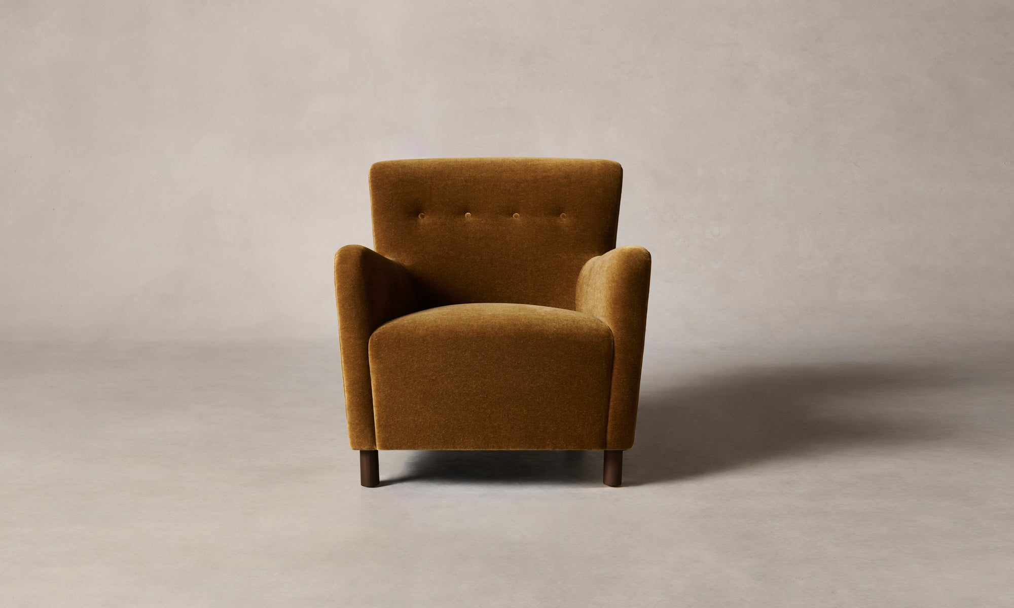 perry accent chair in golden brown mohair fabric and wooden legs