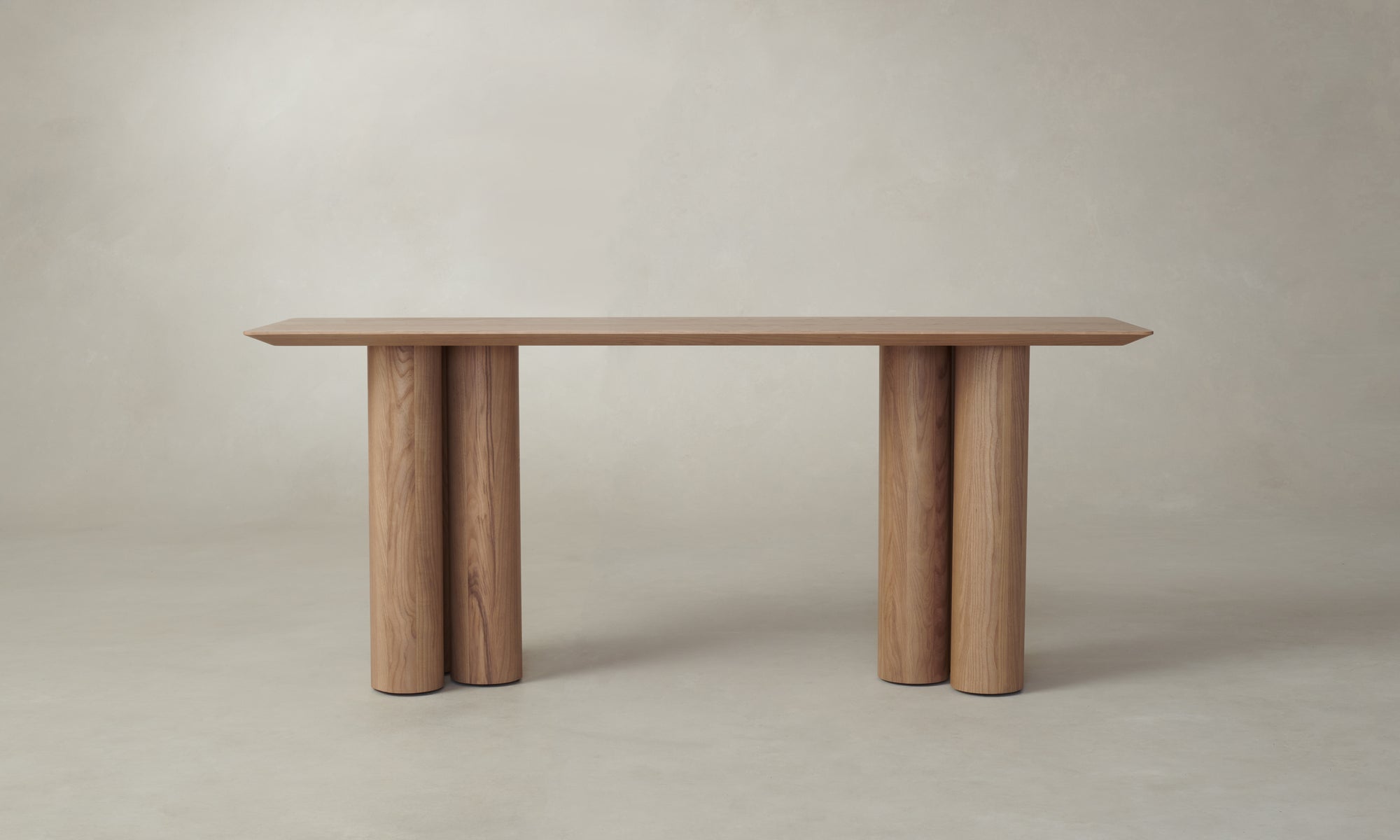 reade console table in brown ash wood with chunky legs