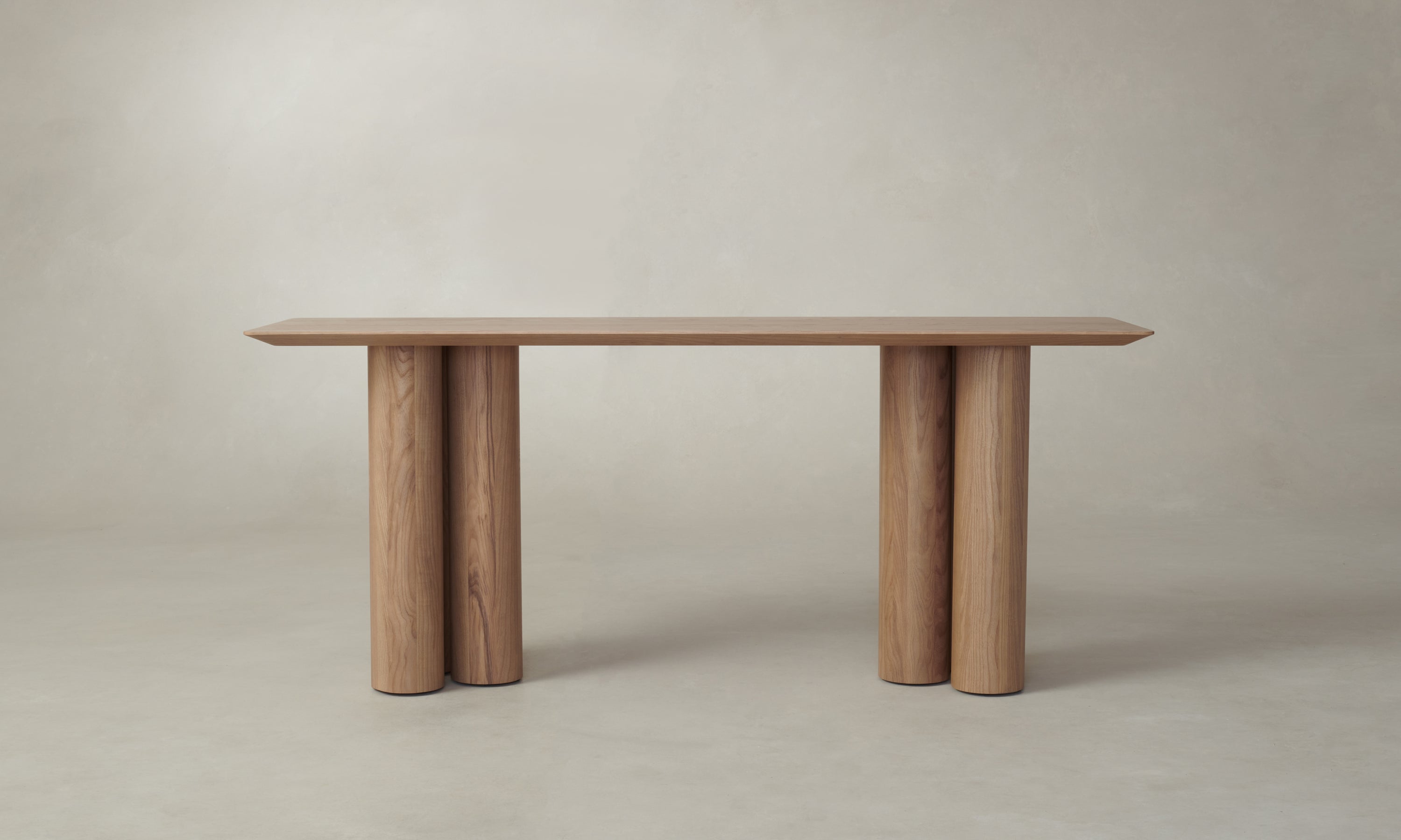 reade console table in brown ash wood with chunky legs