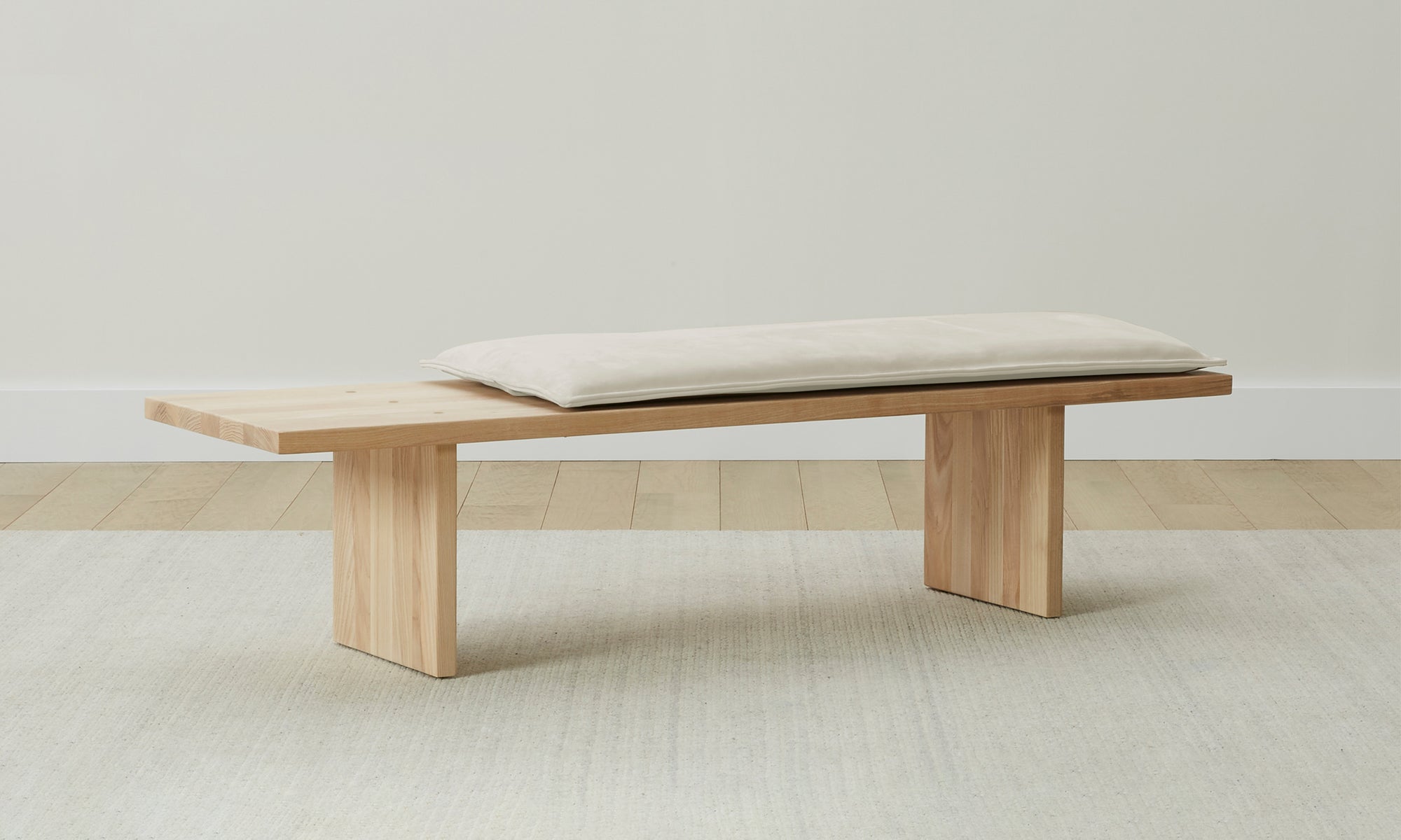 reyes wood bench with beige nubuck leather cushion