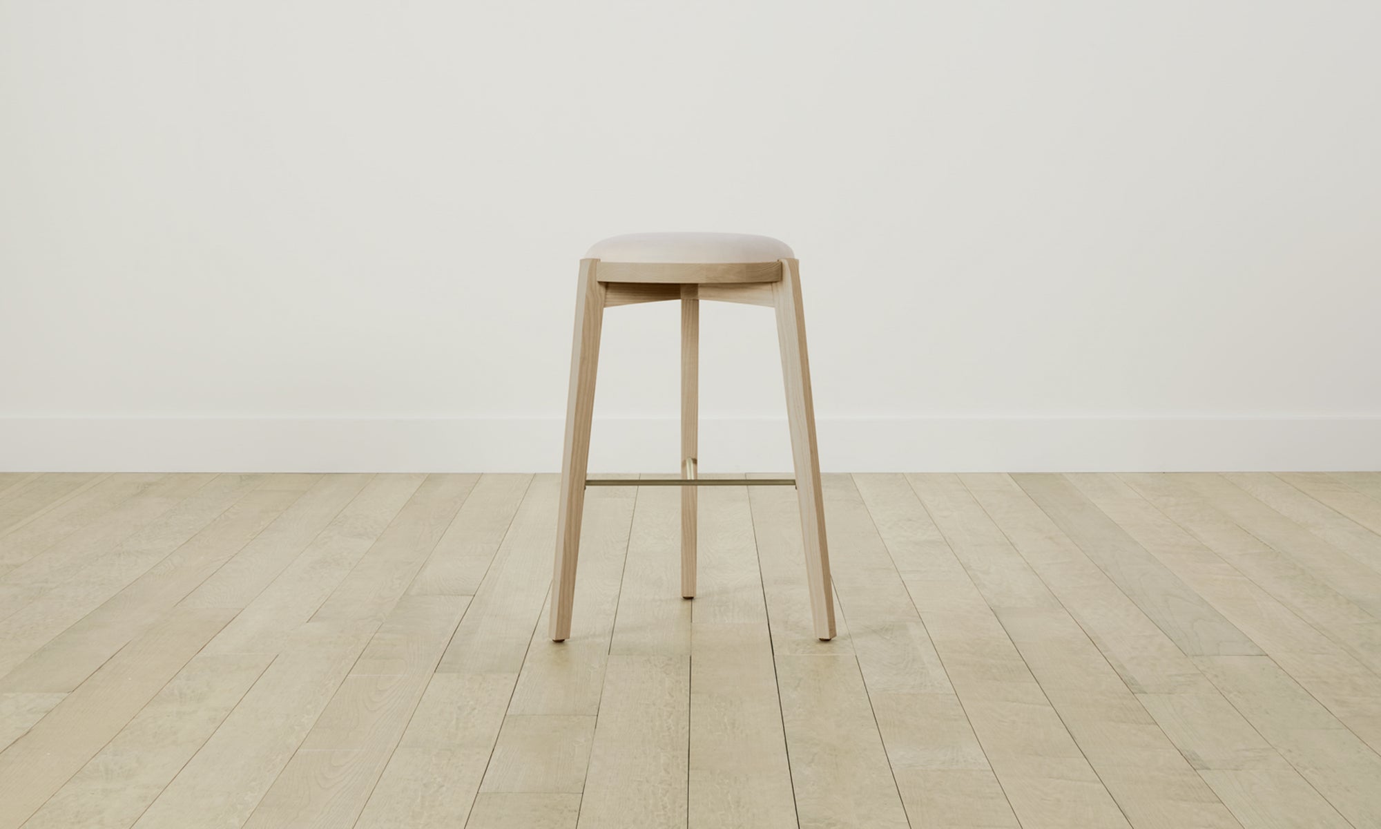 stanton wood barstool in white ash wood with white leather seat and brass footrest