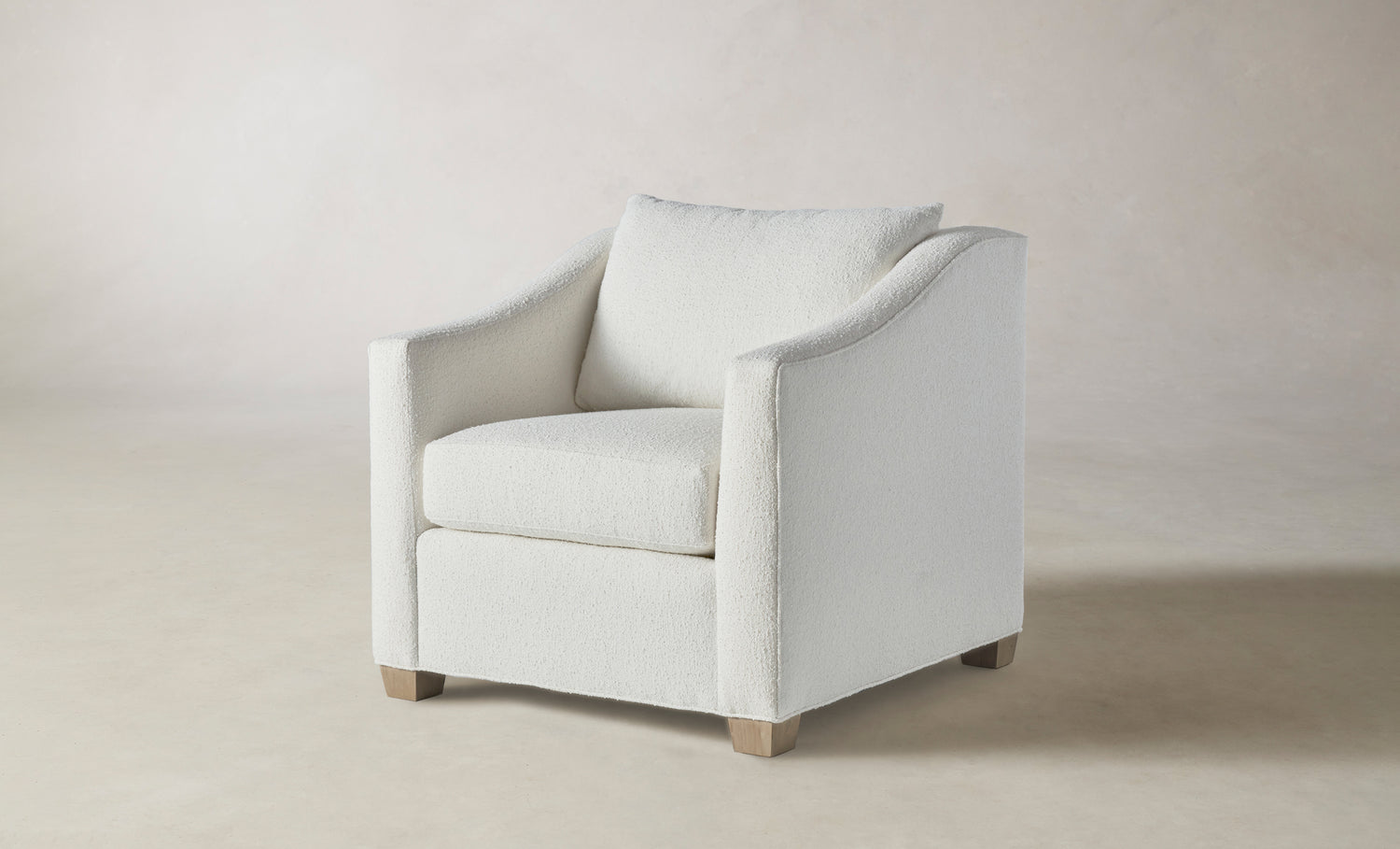 sullivan accent chair in white boucle with wooden legs
