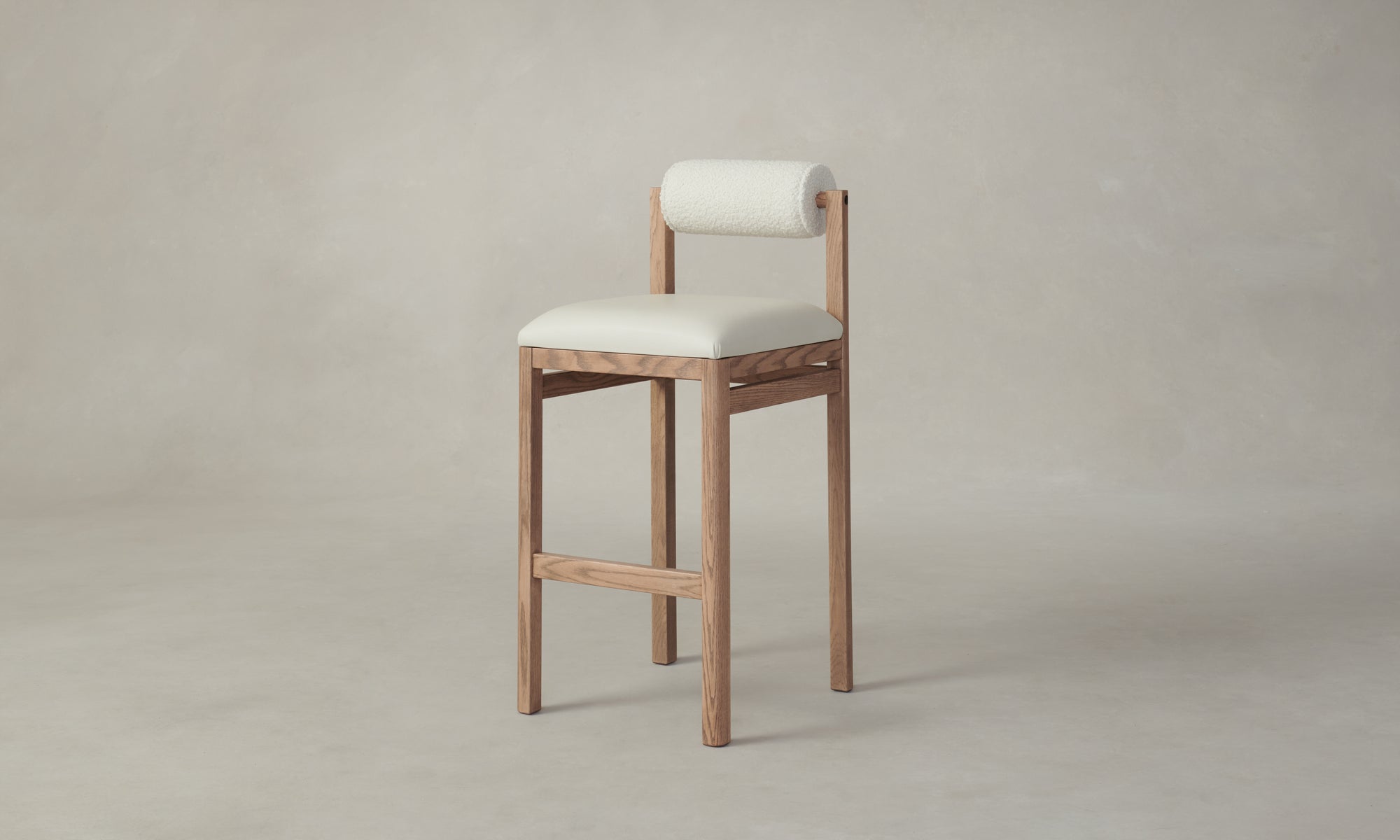 thayer wood barstool in oak with white leather seat and boucle bolster back