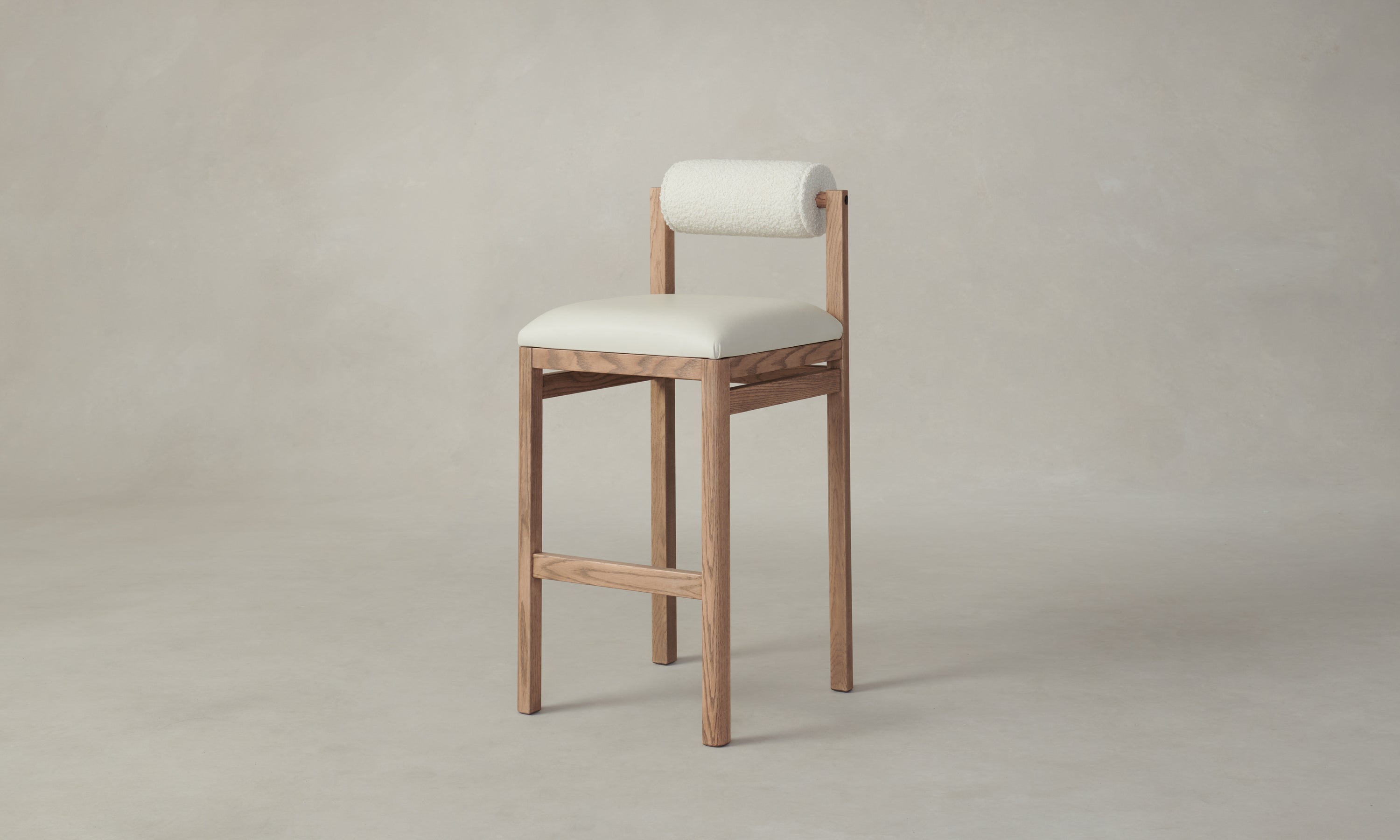 thayer wood barstool in oak with white leather seat and boucle bolster back