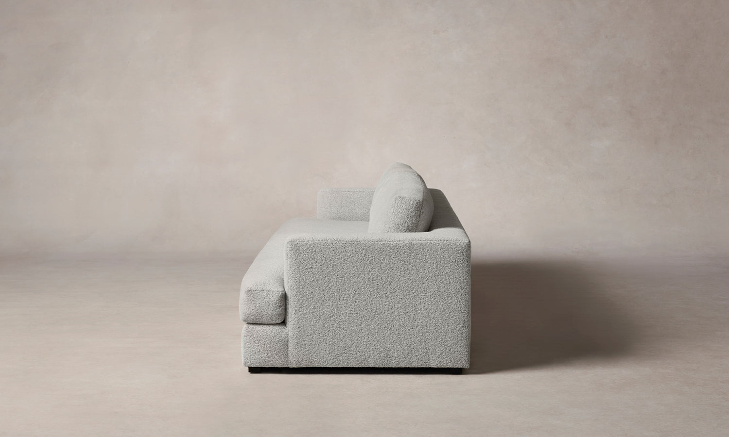 varick sofa in grey woolen boucle, side view